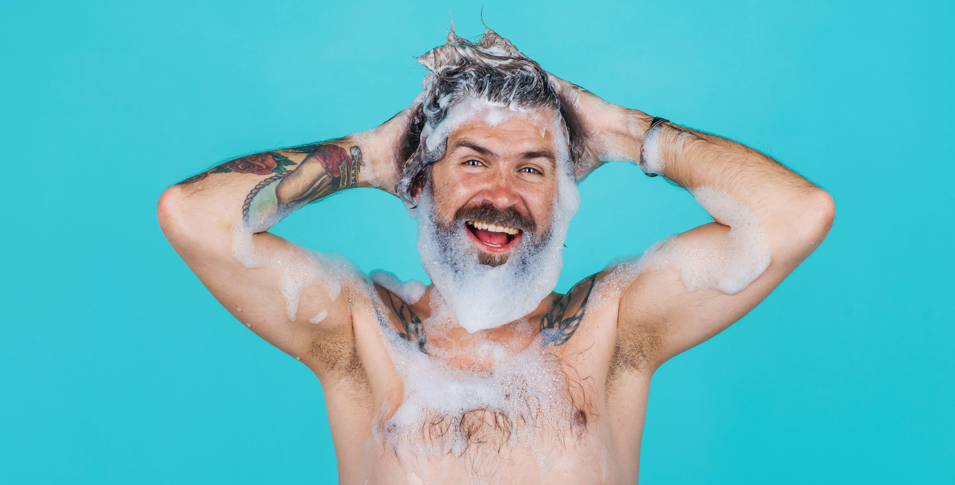 man washing hair and beard