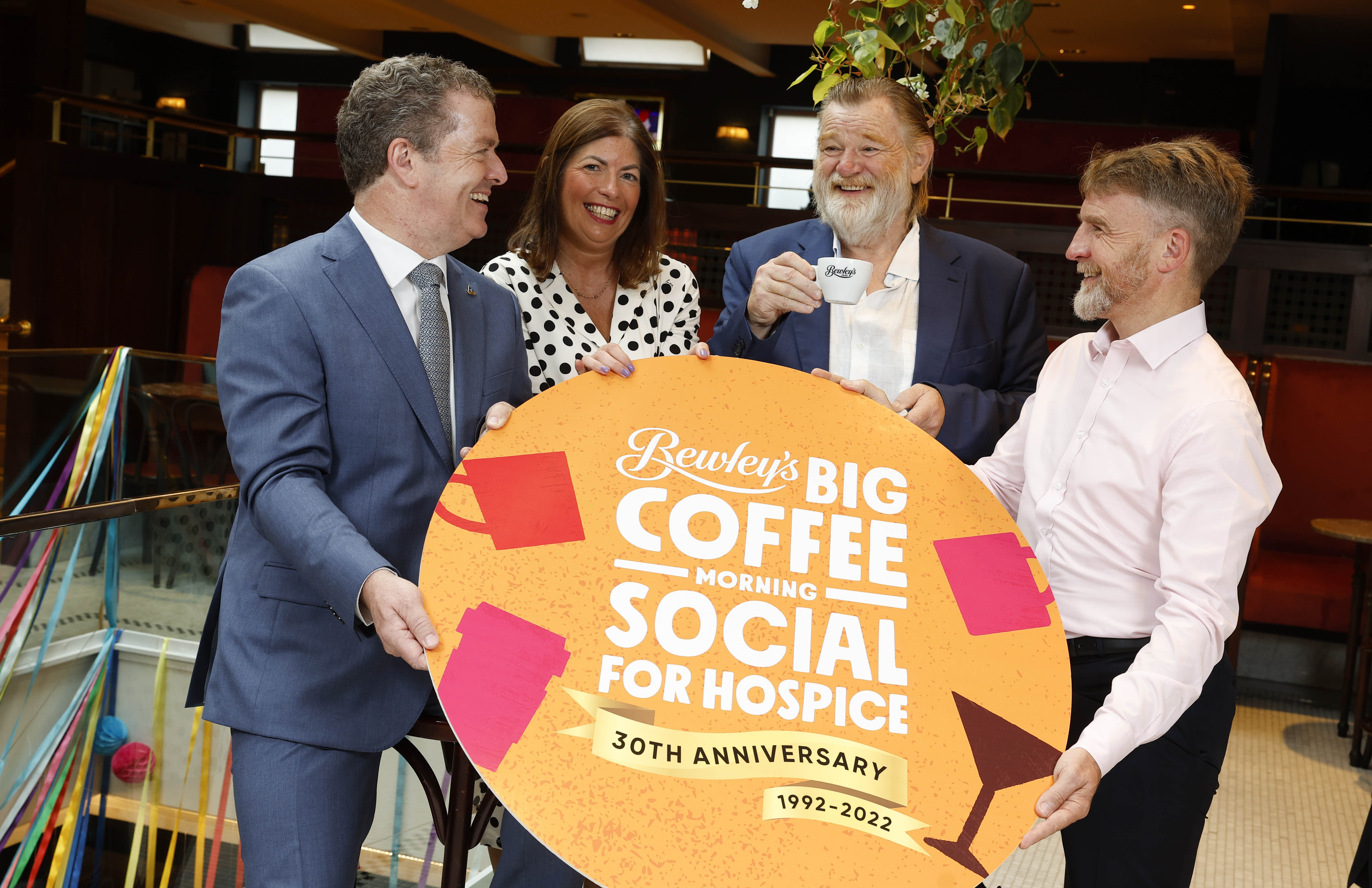 From left, Fintan Fagan, CEO at St Francis Hospice, Audrey Houlihan, chairwoman of Together For Hospice and CEO at Our Lady’s Hospice & Care Services, actor Brendan Gleeson and Col Campbell of Bewley’s pictured at the launch of Bewley’s Big Coffee Morning Social for Hospice (Conor McCabe Photography/PA)