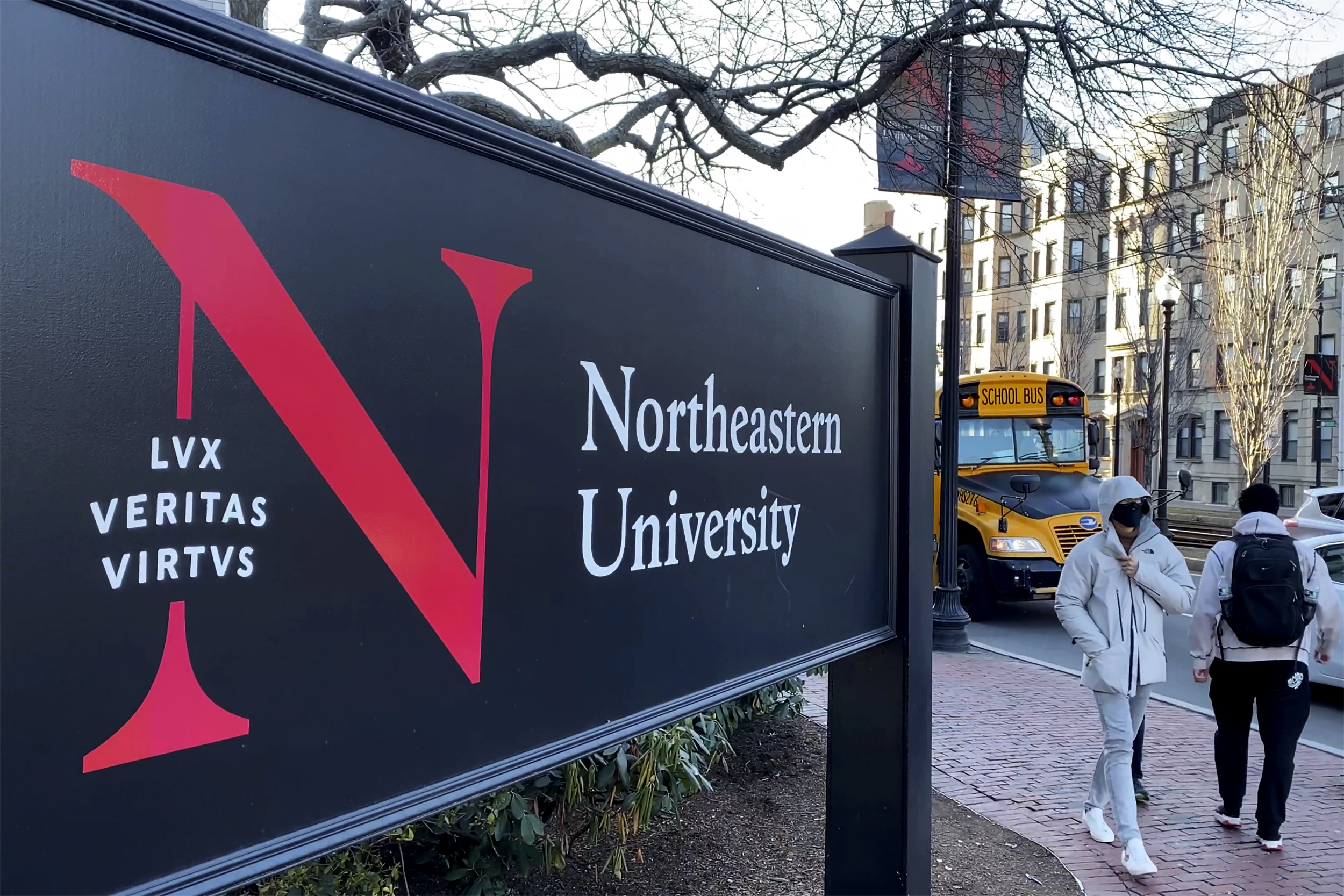 Students walk on the Northeastern University campus in Boston