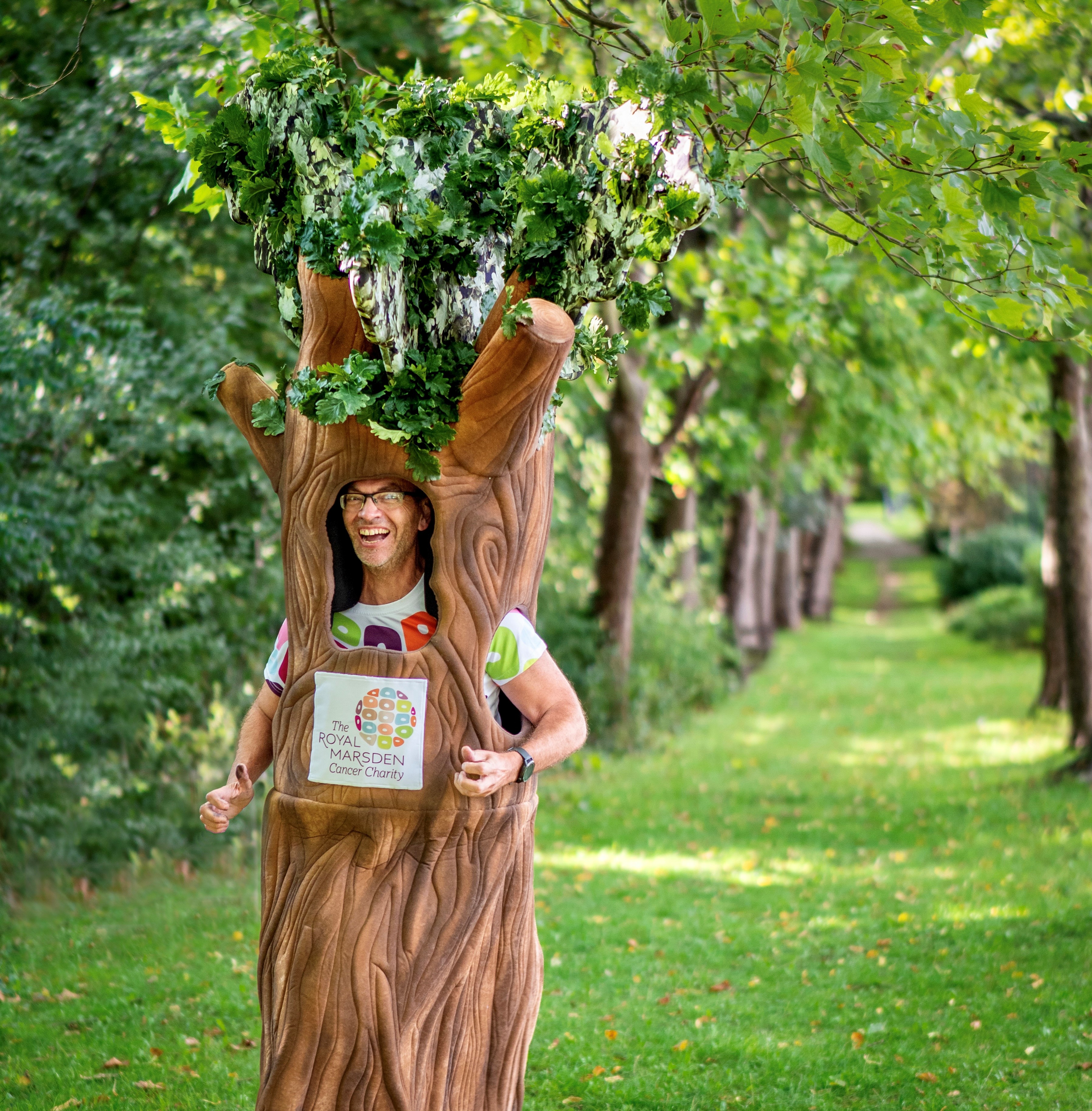 Man wearing a tree costume