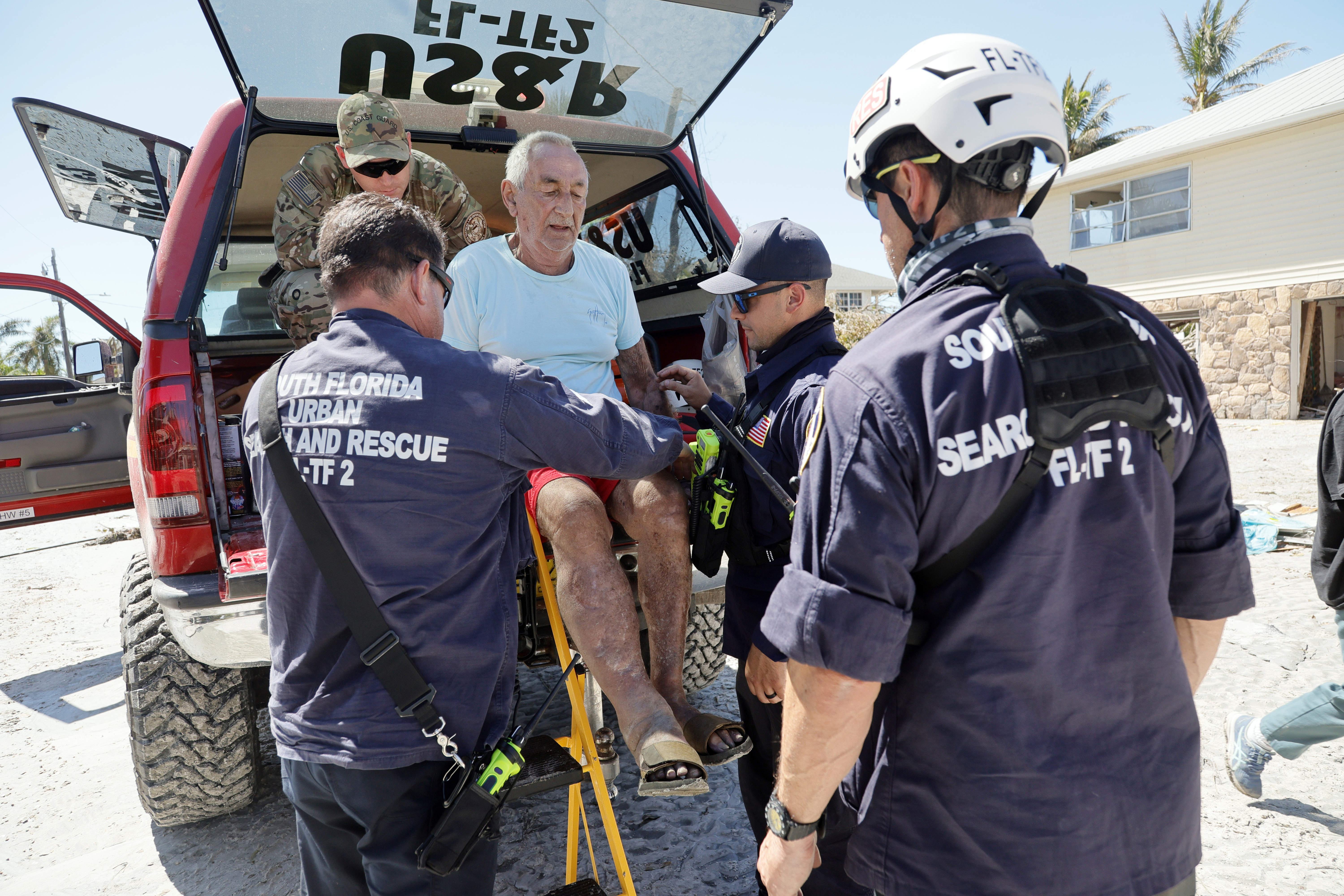 Florida rescue team members evacuate John Van Fleet