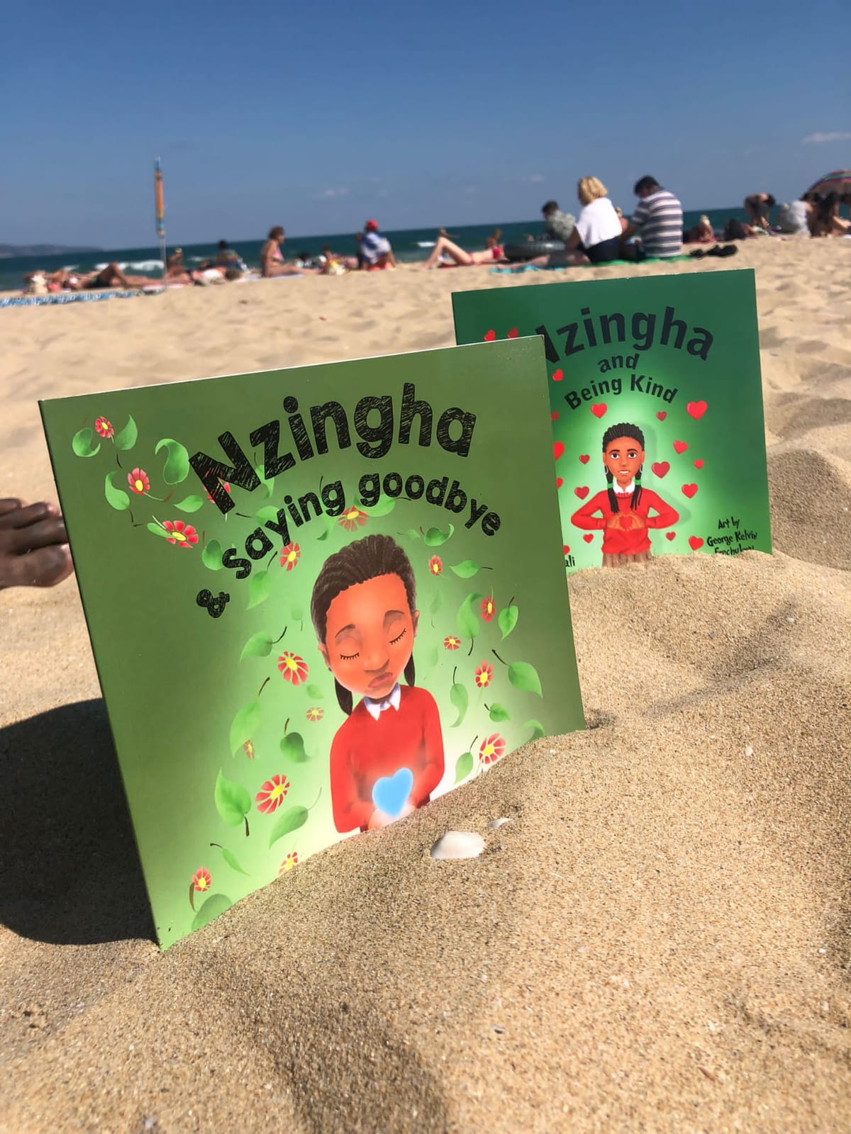 Books in the sand
