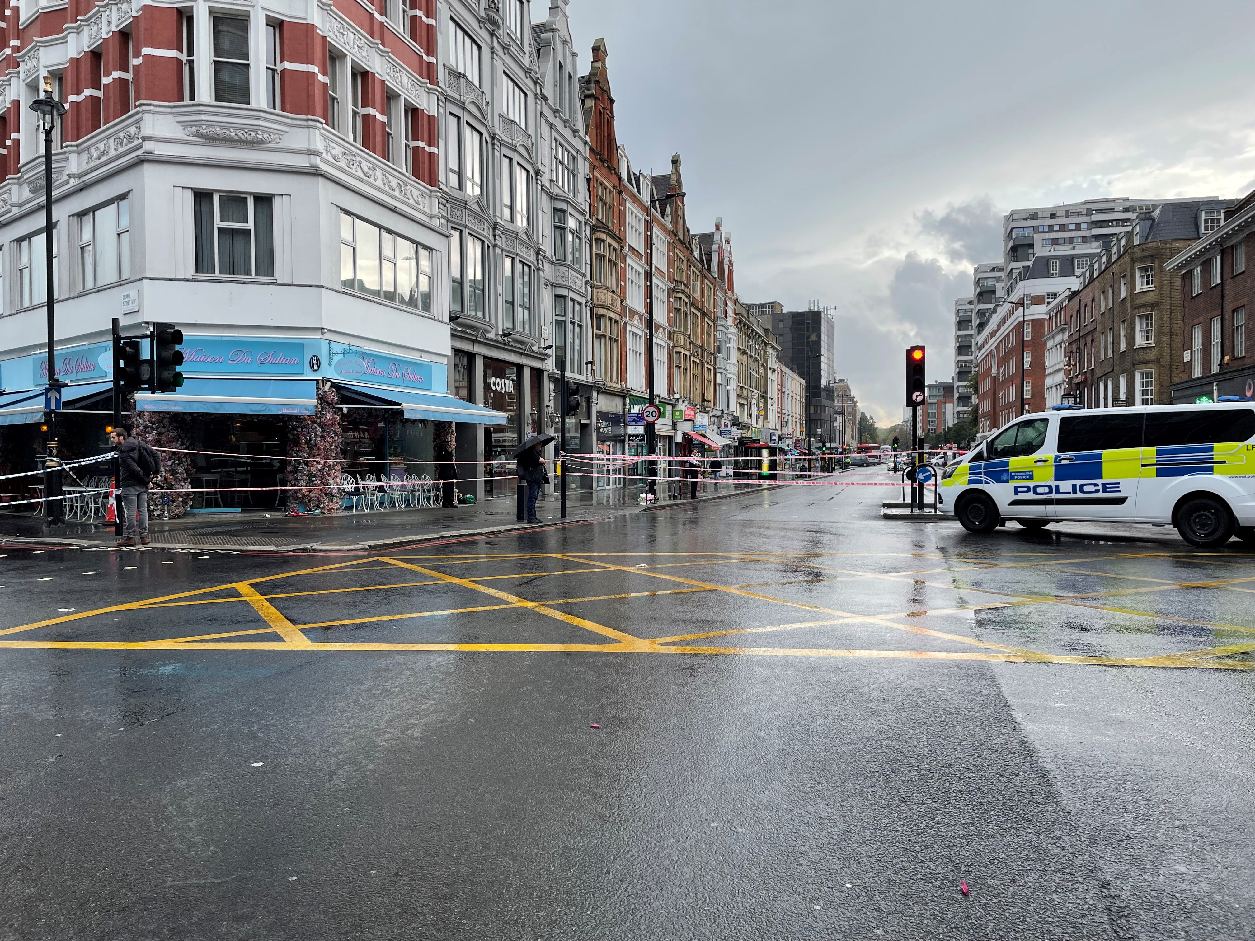 Knifeman caught by members of public after woman stabbed in coffee shop