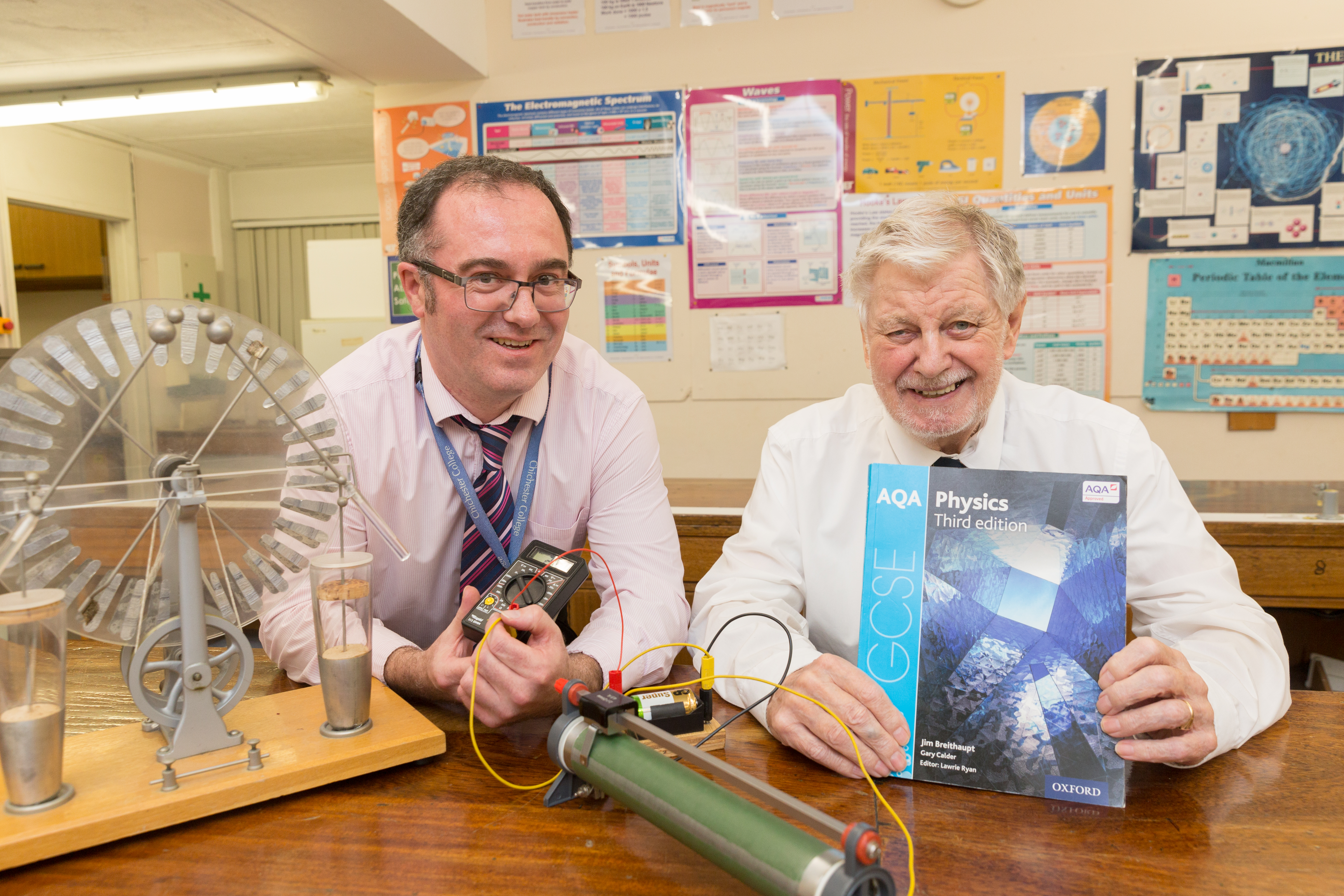 Ernie Puffett, 84, posing with one of the teachers