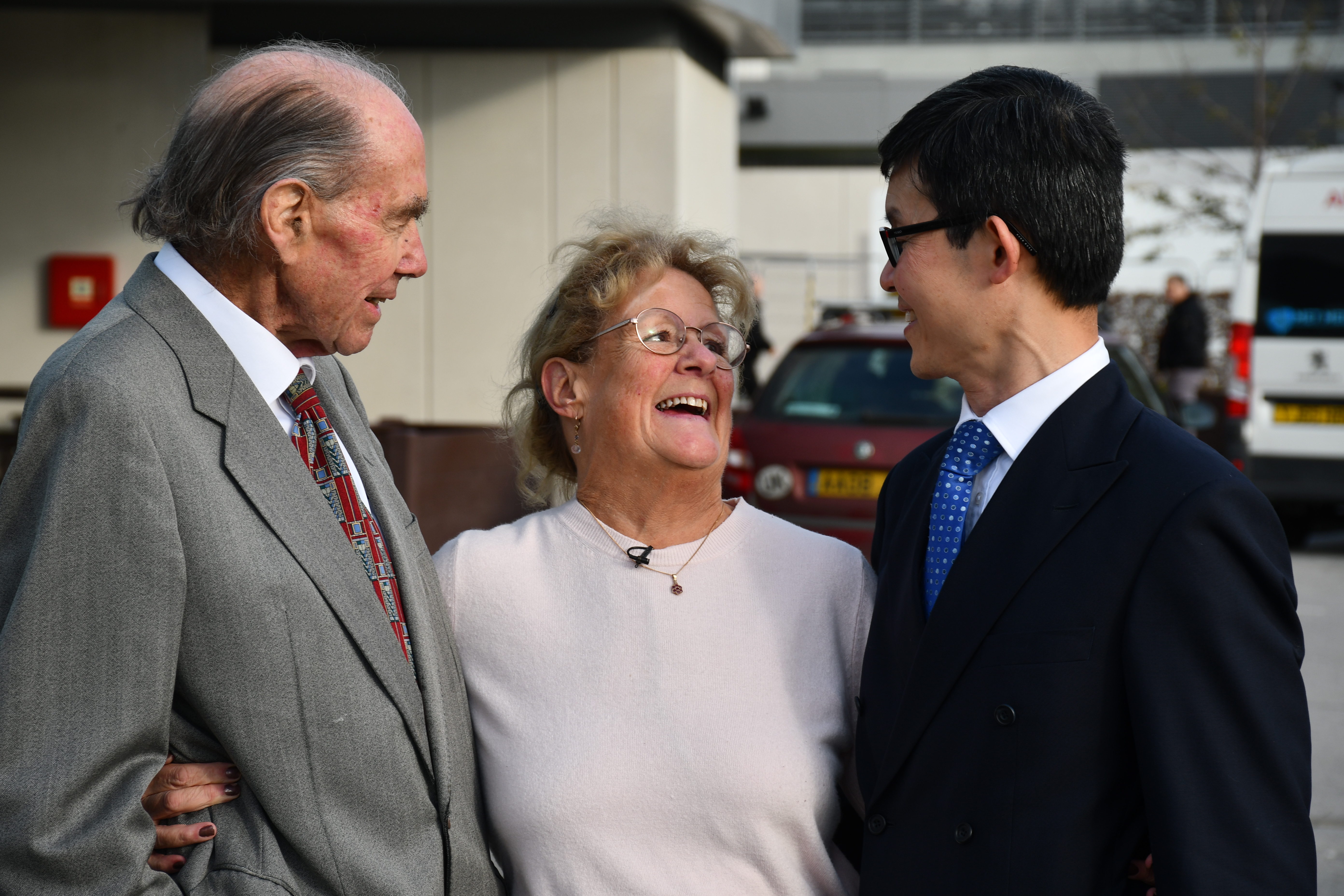 Sandy Law with Sir Terence English (left), who led the team for her first surgery, and Mr Steven Tsui (right) who led the team for her second surgery. (Royal Papworth Hospital/ PA)