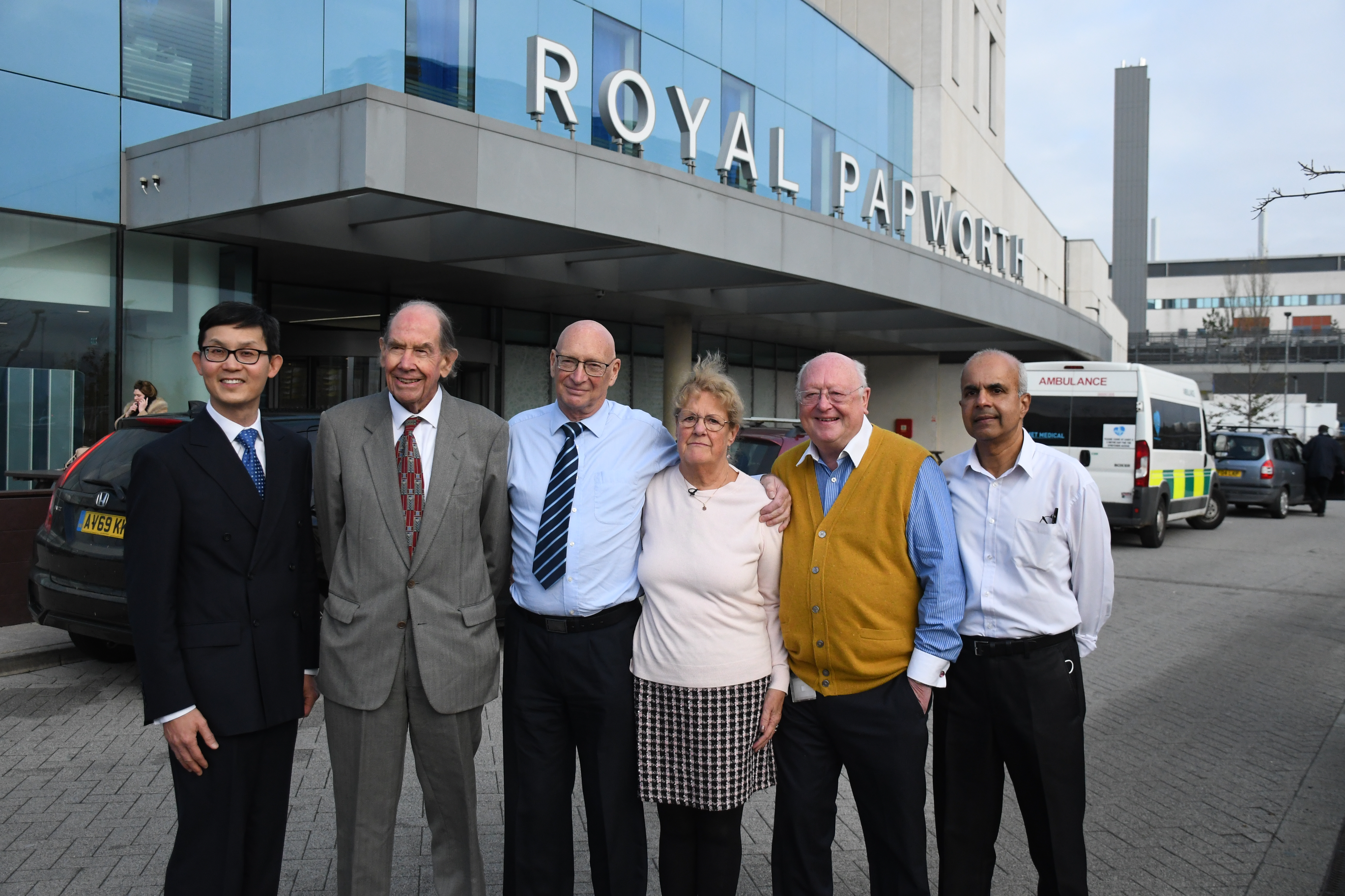 Sandy Law and her husband Terry Law with some of the NHS staff who have cared for her over the years. (Royal Papworth Hospital/ PA)