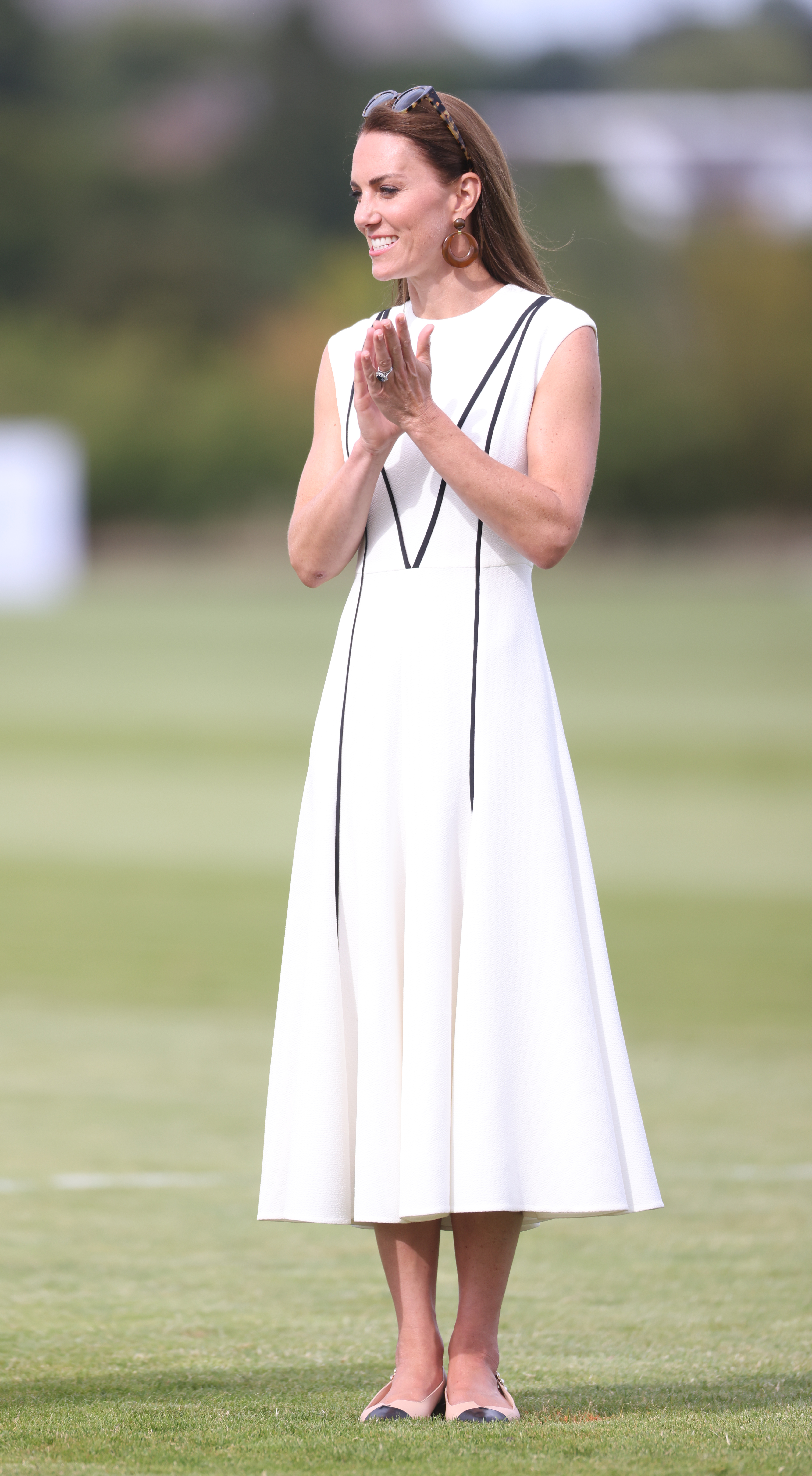 The Duchess of Cambridge at the Out-Sourcing Inc charity polo match at Guards Polo Club, Smiths Lawn, Windsor