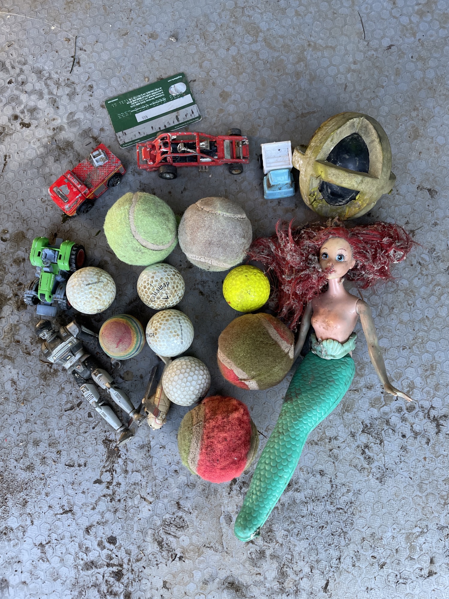 Golf balls, tennis balls, a mermaid doll, toy cars and a bank card among the objects removed from sewers