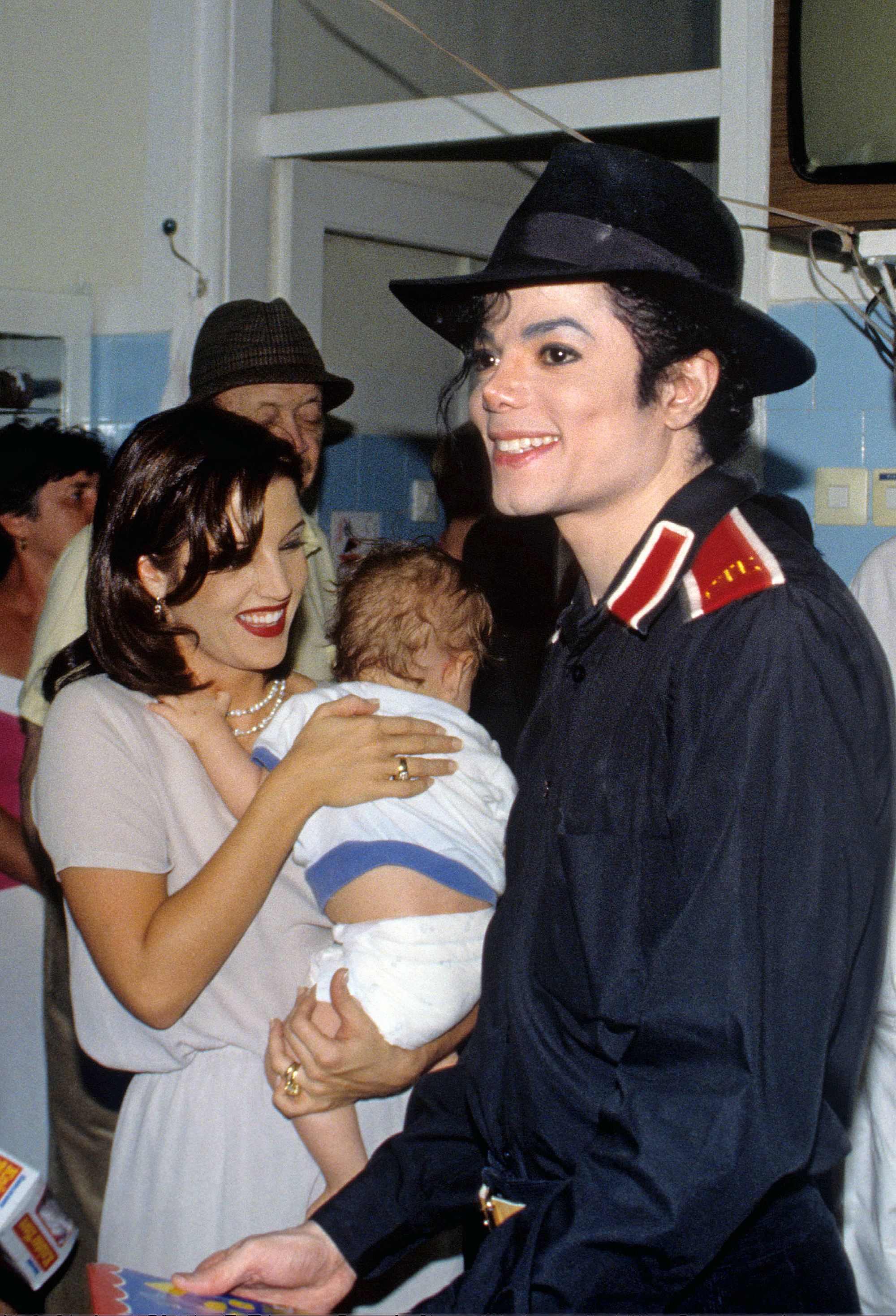 Lisa Marie Presley and Michael Jackson visiting a hospital in Budapest in 1994
