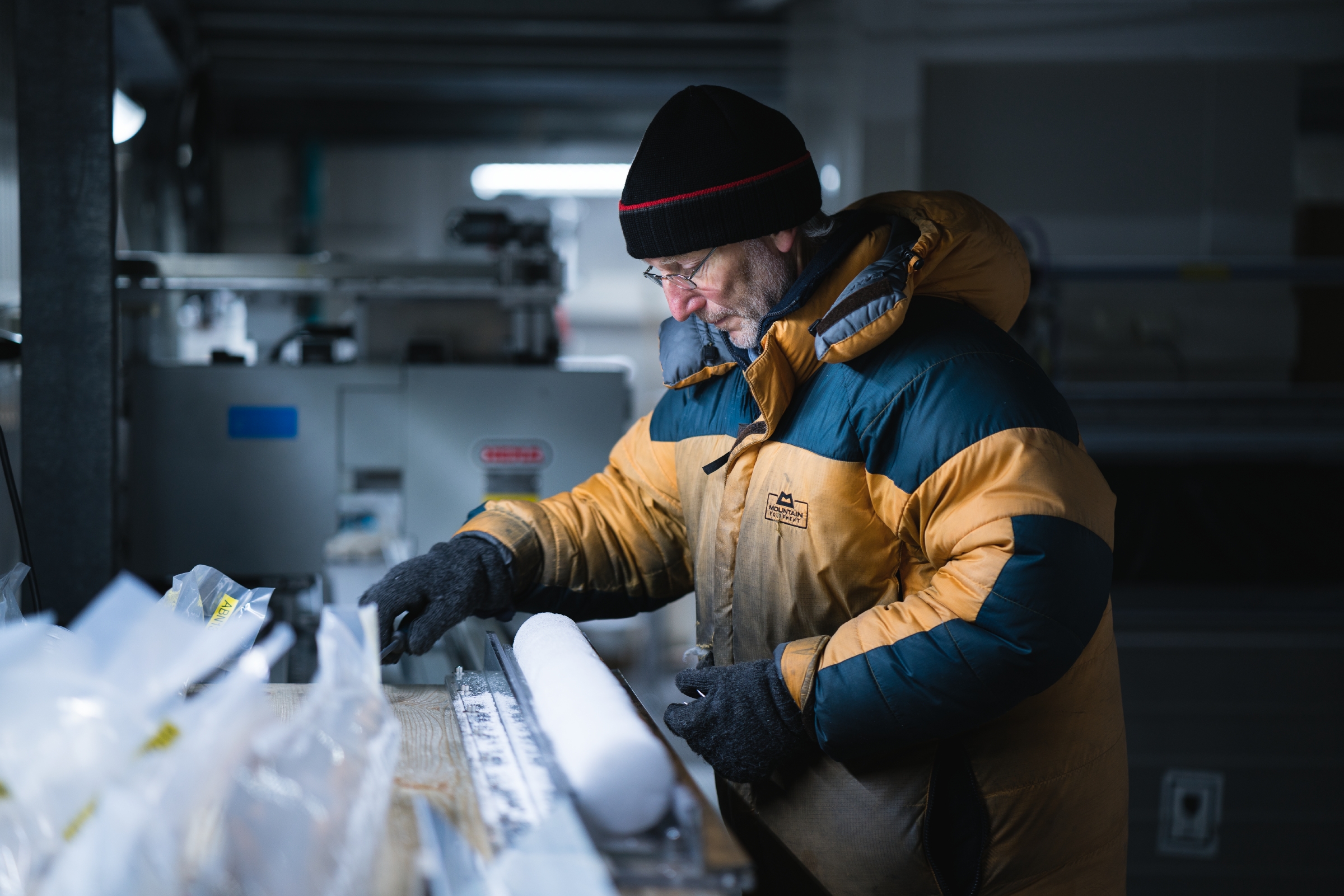 Glaciologists working on the drilled ice cores.