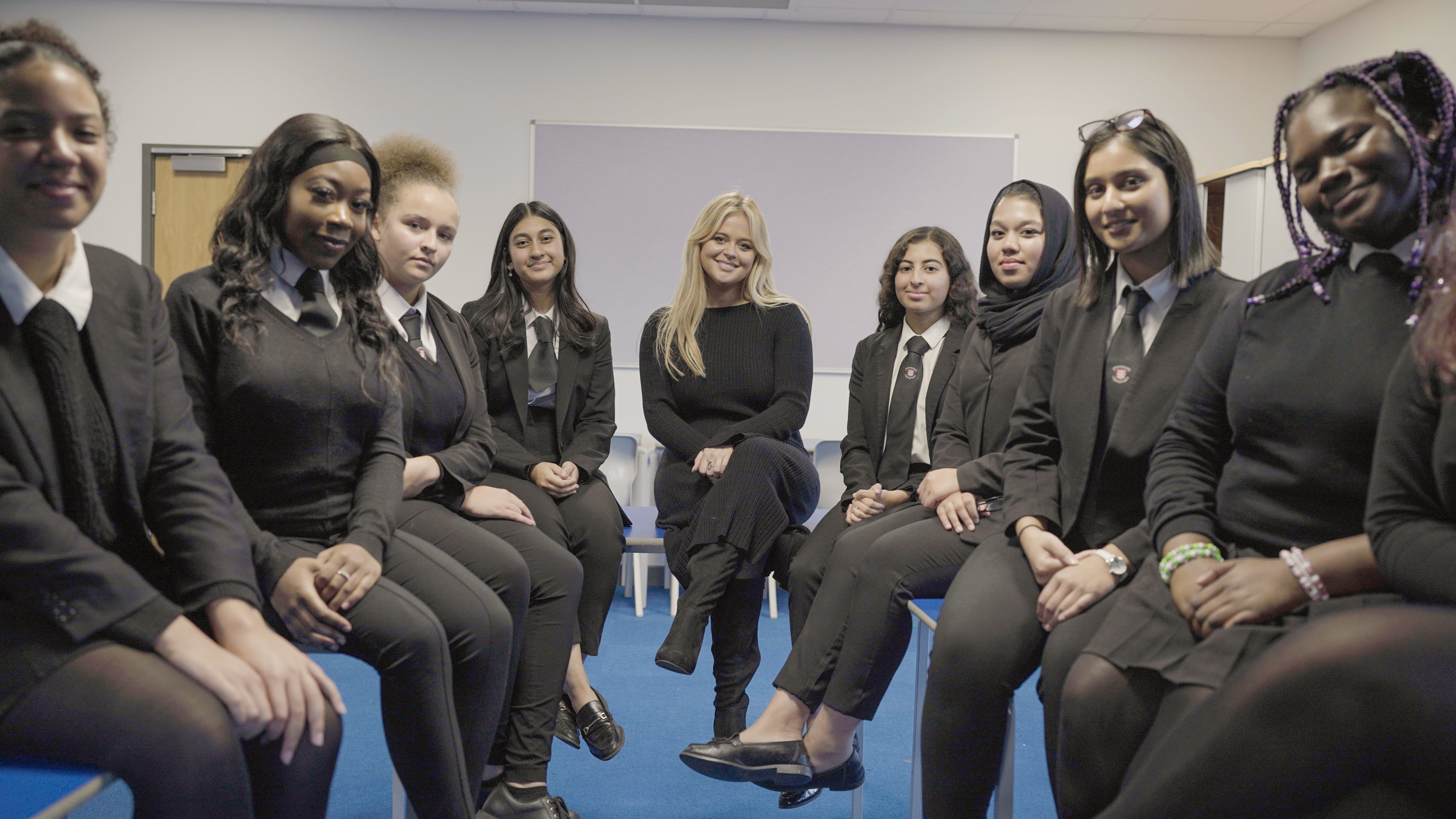 Emily Atack talking to school girls in the documentary (BBC/Little Gem Productions)