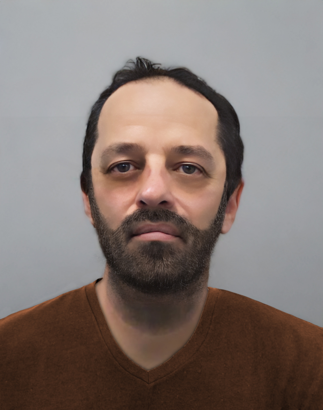 The updated e'fit of Neil Maxwell, who police believe lost weight and grew a beard to change his appearance.