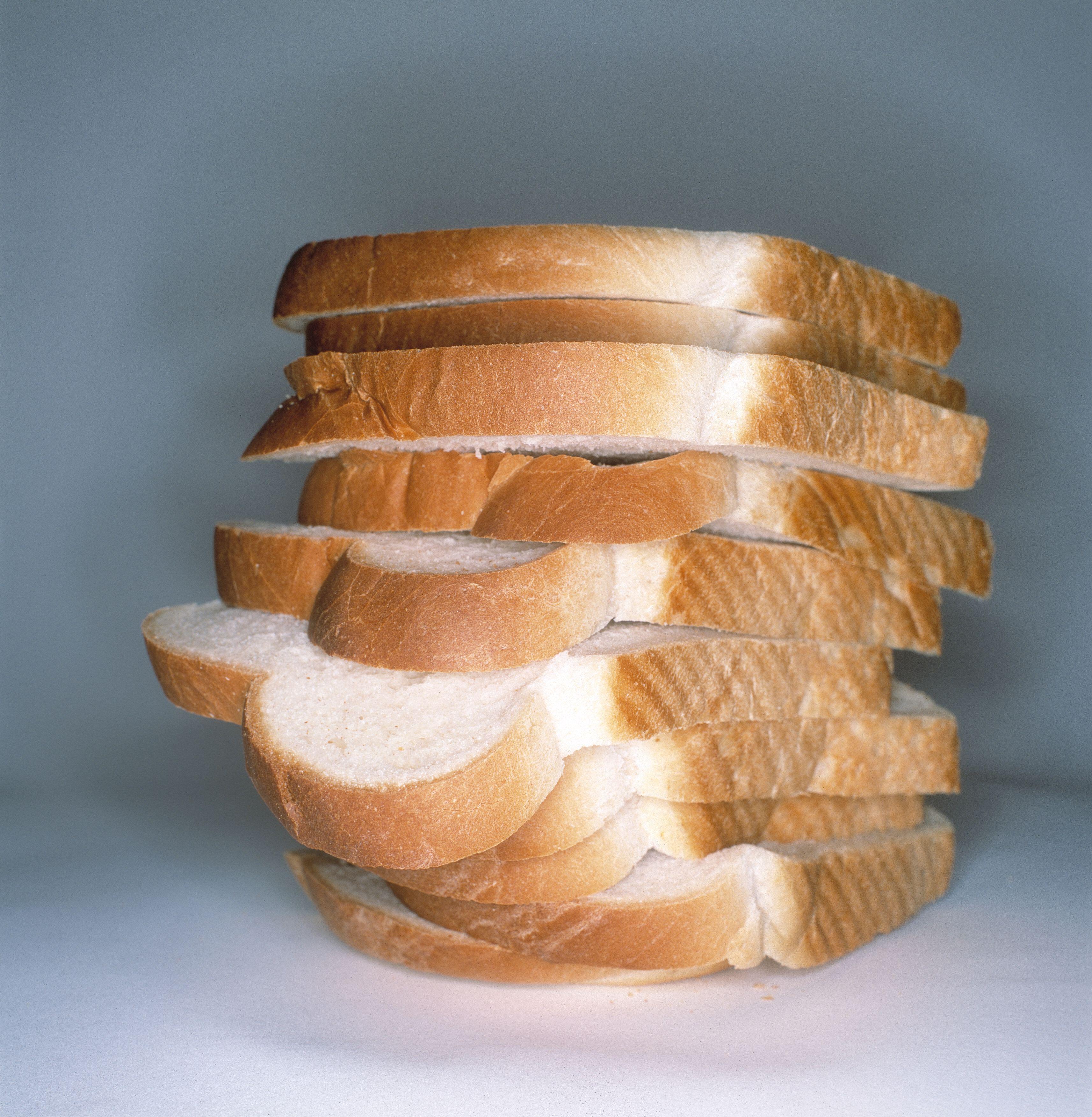 A stack of sliced white bread