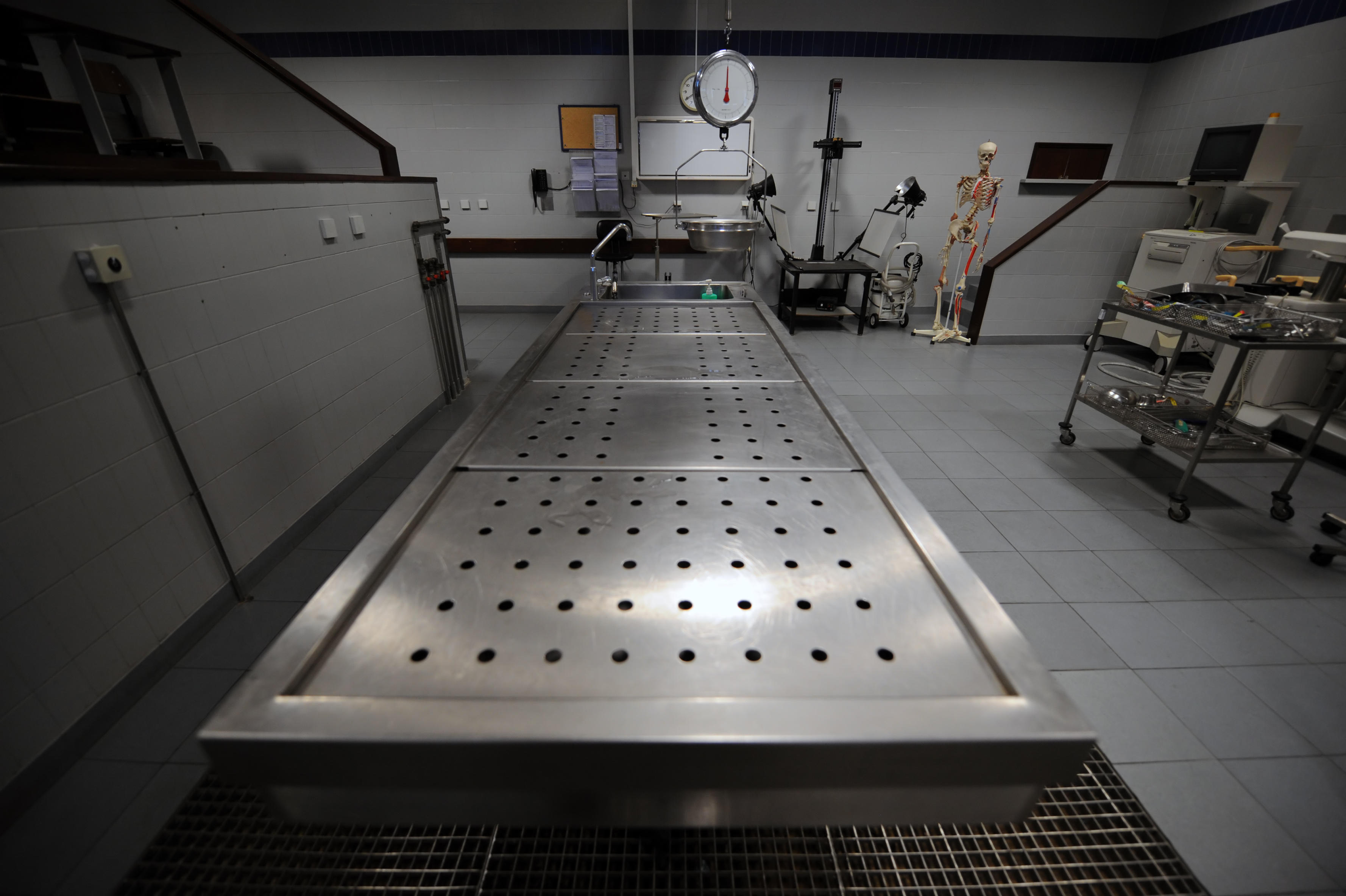 Autopsy table at a morgue - stock photo