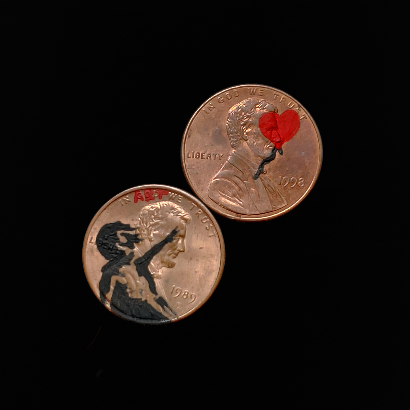 Brown pennies with paintings on them