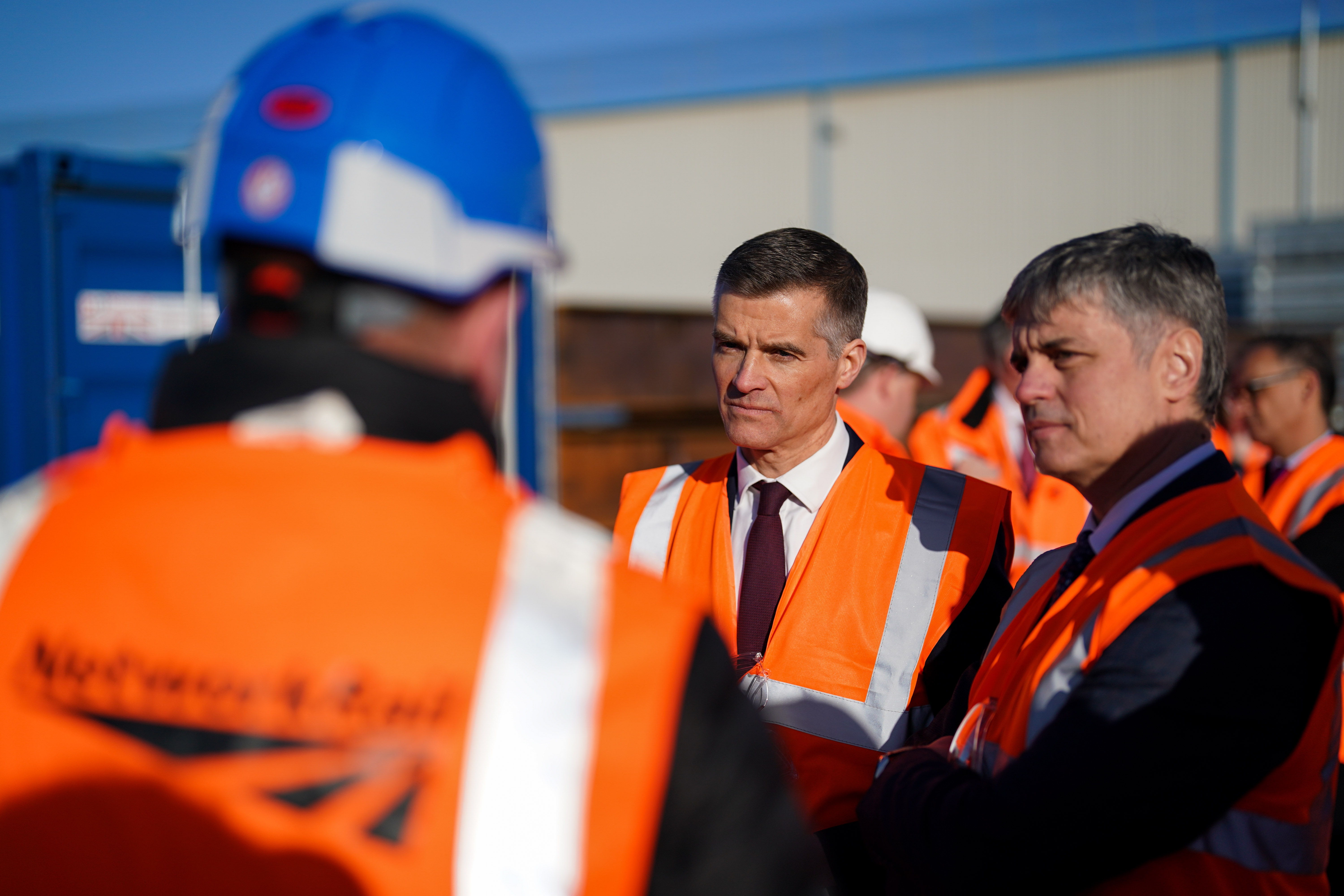 DO NOT PUBLISH BEFORE EMBARGOED 00.01 FEB 21  Transport Secretary Mark Harper (centre) and Ukraine Ambassador to the UK  Vadym Prystaiko talk to a Ukrainian engineer during a visit to Mabey Bridge HQ engineering firm in Gloucester where they received training. (Jacob King/PA Wire)