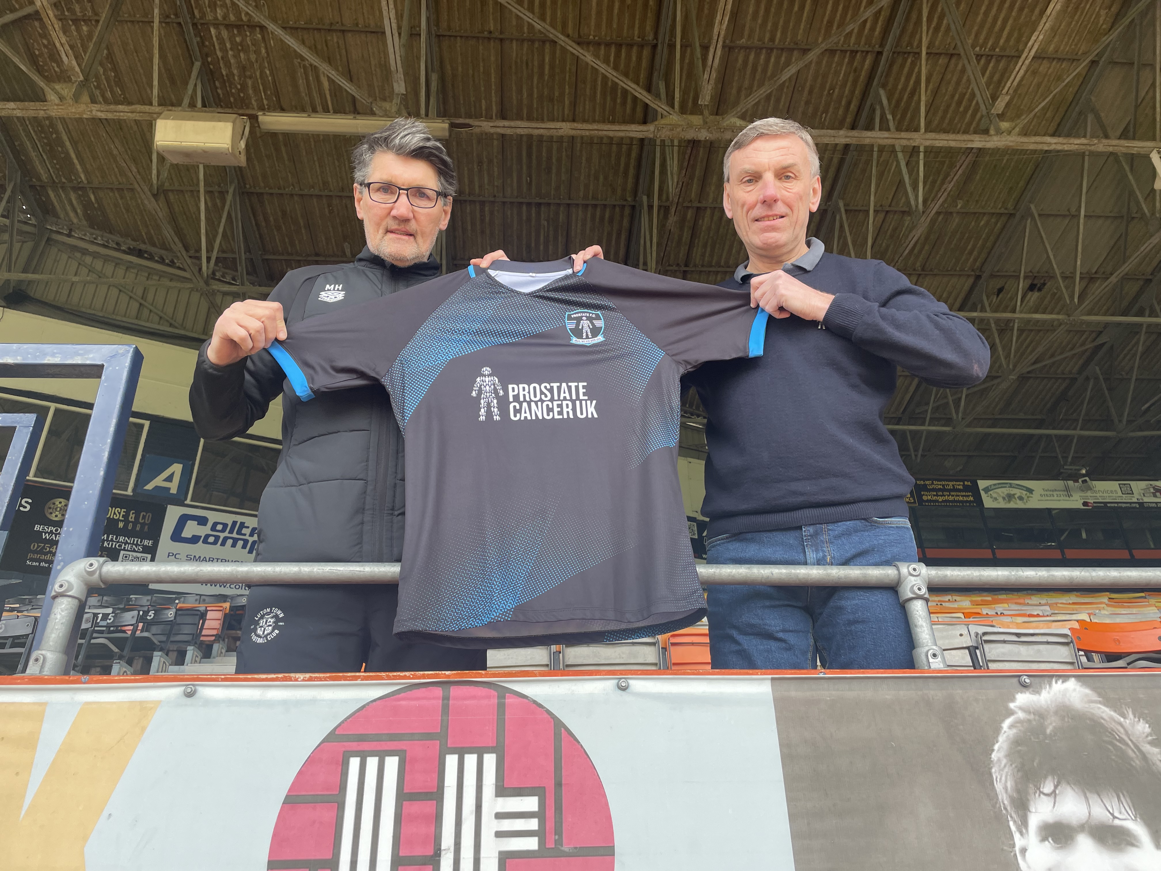 Mick Harford (left) and Luton’s head matchday hospitality host Les Turton (right) are helping promote Prostate FC