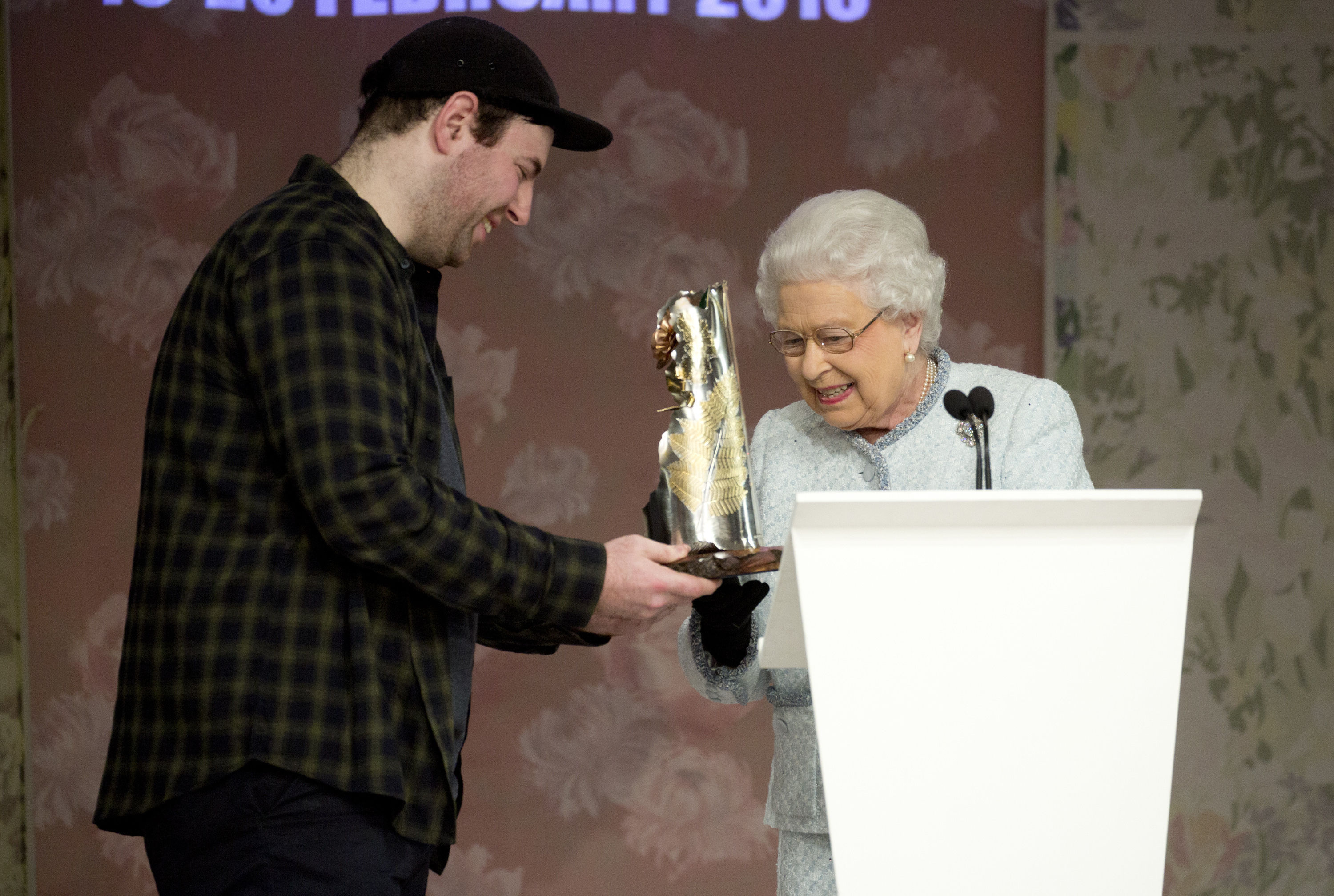 Queen Elizabeth II presents the inaugural Queen Elizabeth II Award for British Design to Richard Quinn