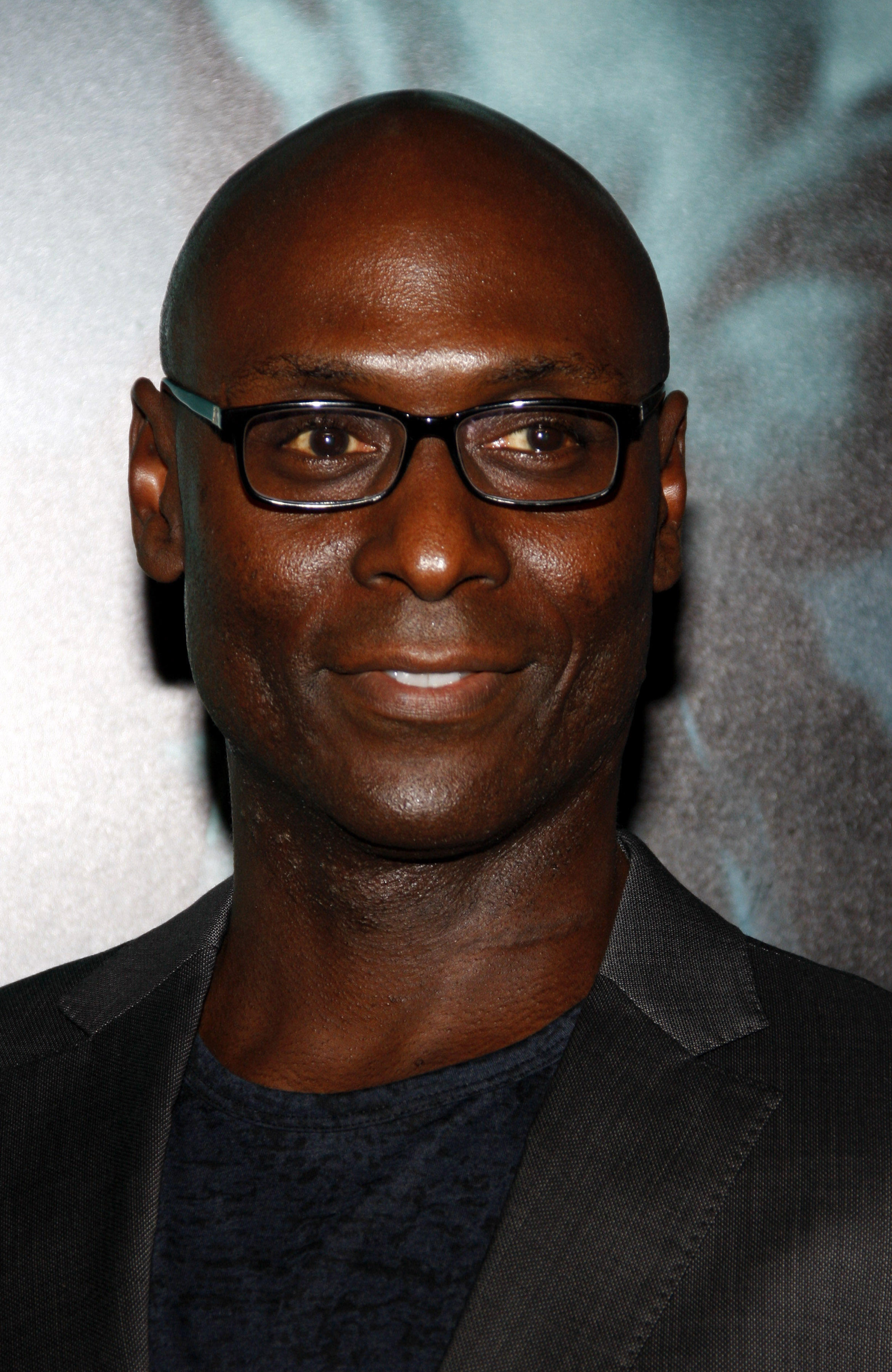 Keanu Reeves Pays Tribute to Lance Reddick at “John Wick 4