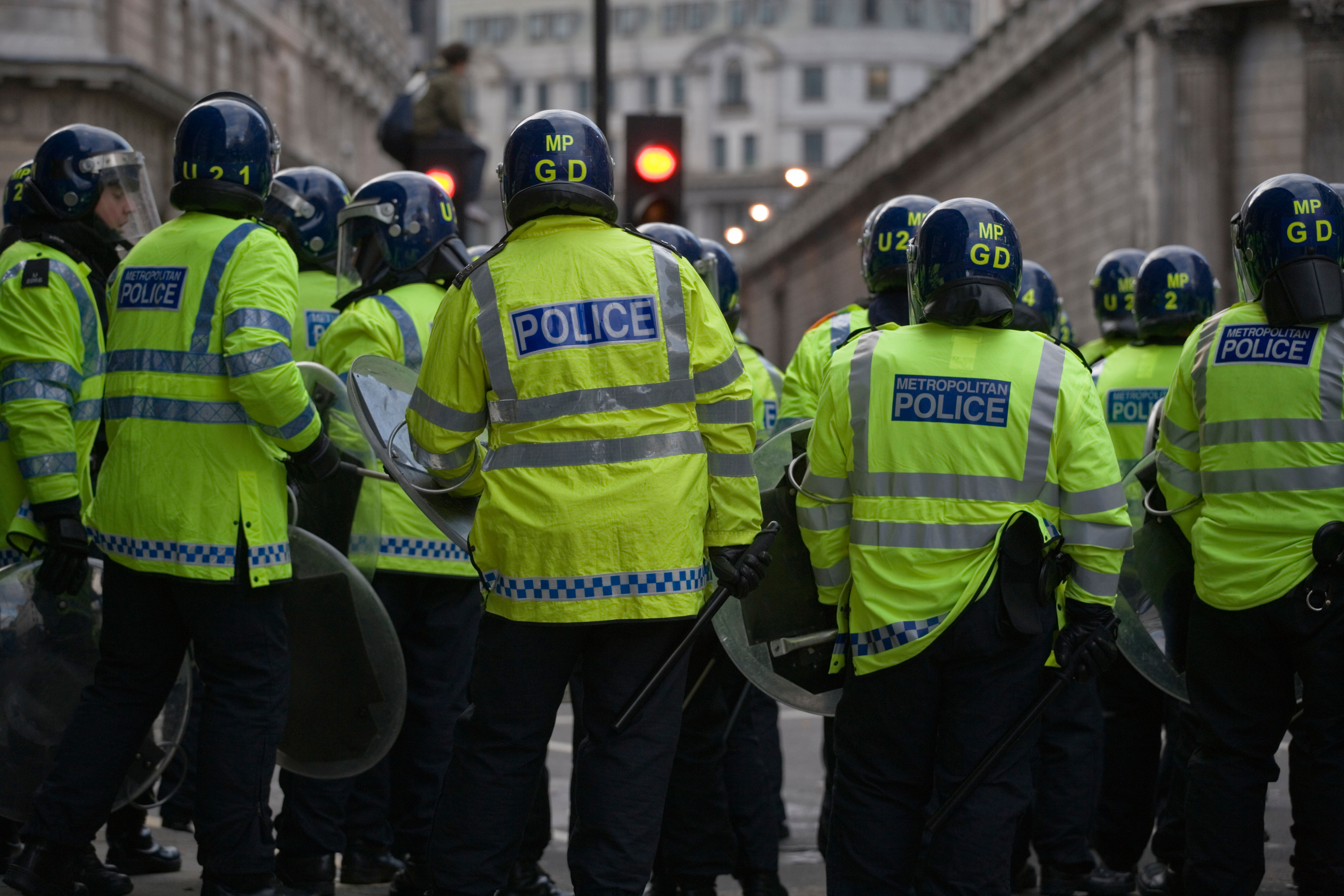 Line of police in partial riot gear during anti-capitalist demonstration against G20 summit in London
