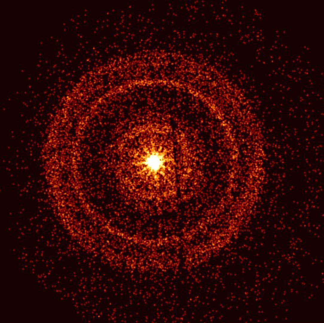 Swift’s X-Ray Telescope captured the afterglow of GRB 221009A about an hour after it was first detected. The bright rings form as a result of X-rays scattered by otherwise unobservable dust layers within our galaxy that lie in the direction of the burst. The dark vertical line is an artifact of the imaging system