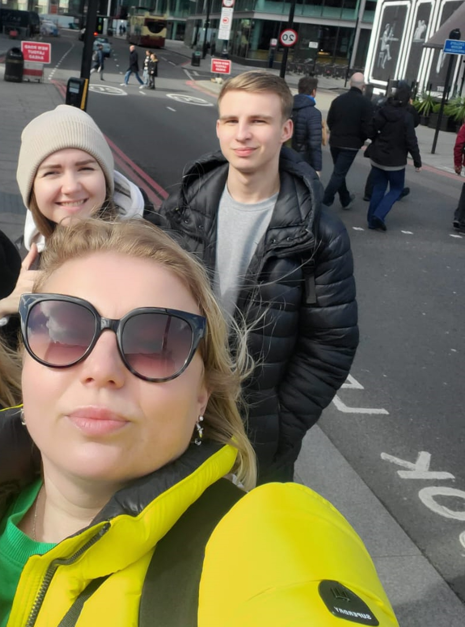 Denys Dreyzer, 18, from Kherson (back right) with his friend Viktoriia (back left) and mother Ganna (front)