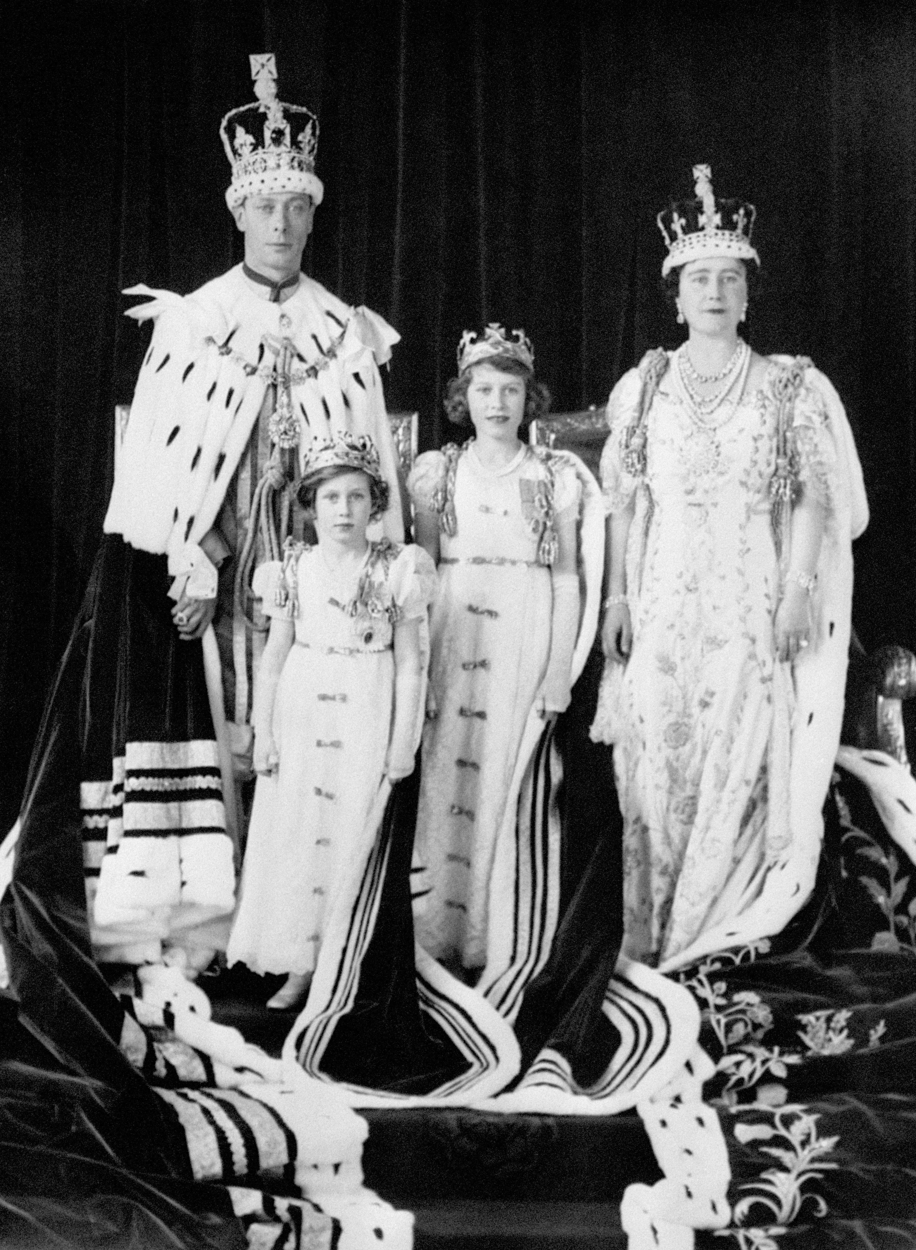 King George VI and Queen Elizabeth with their daughters Princess Elizabeth and Princess Margaret after the coronation