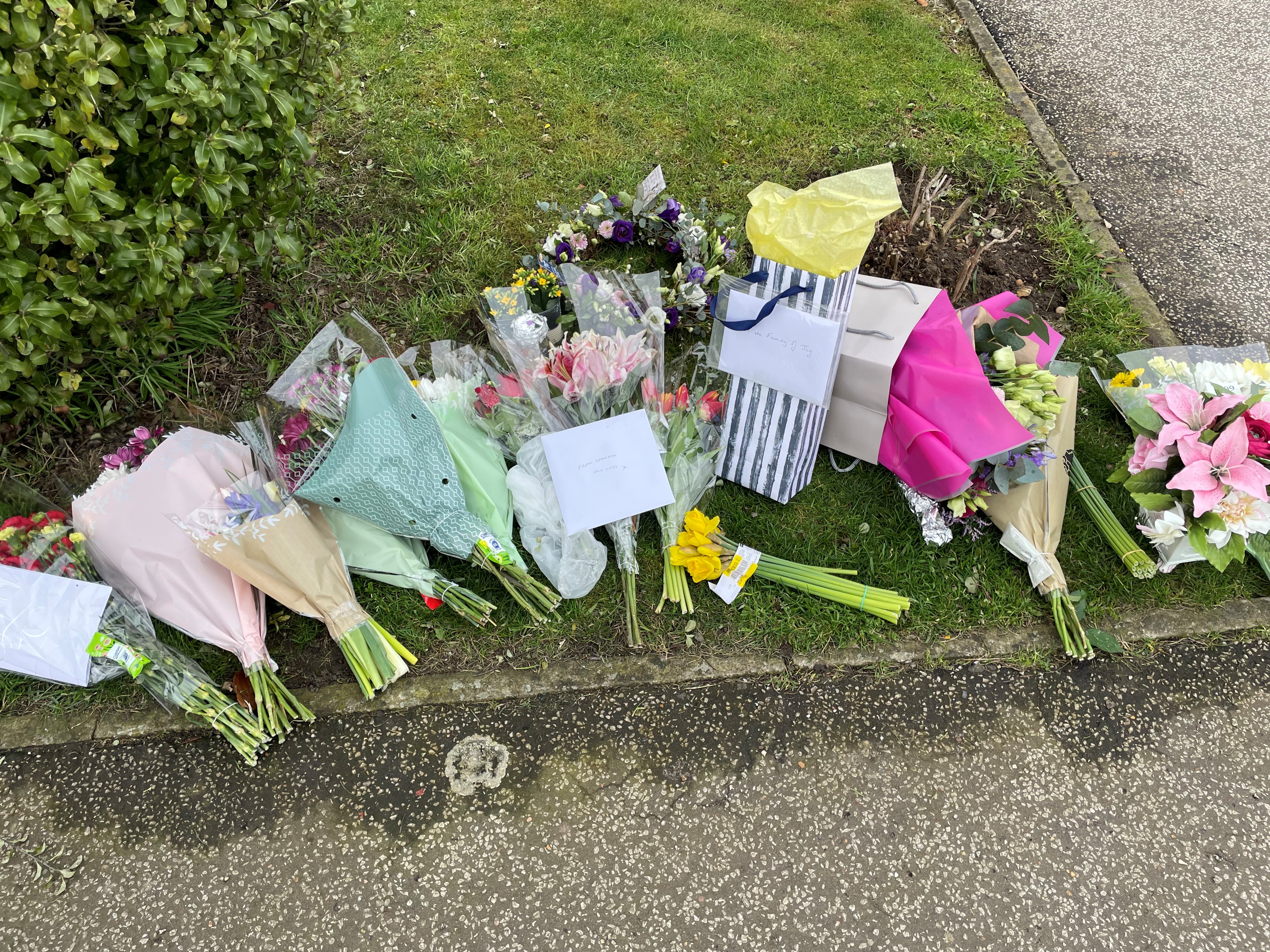 Floral tributes in Grayson Avenue, Pakefield, Suffolk as police investigate the murder of pensioner Joy Middleditch. (Sam Russell/ PA)