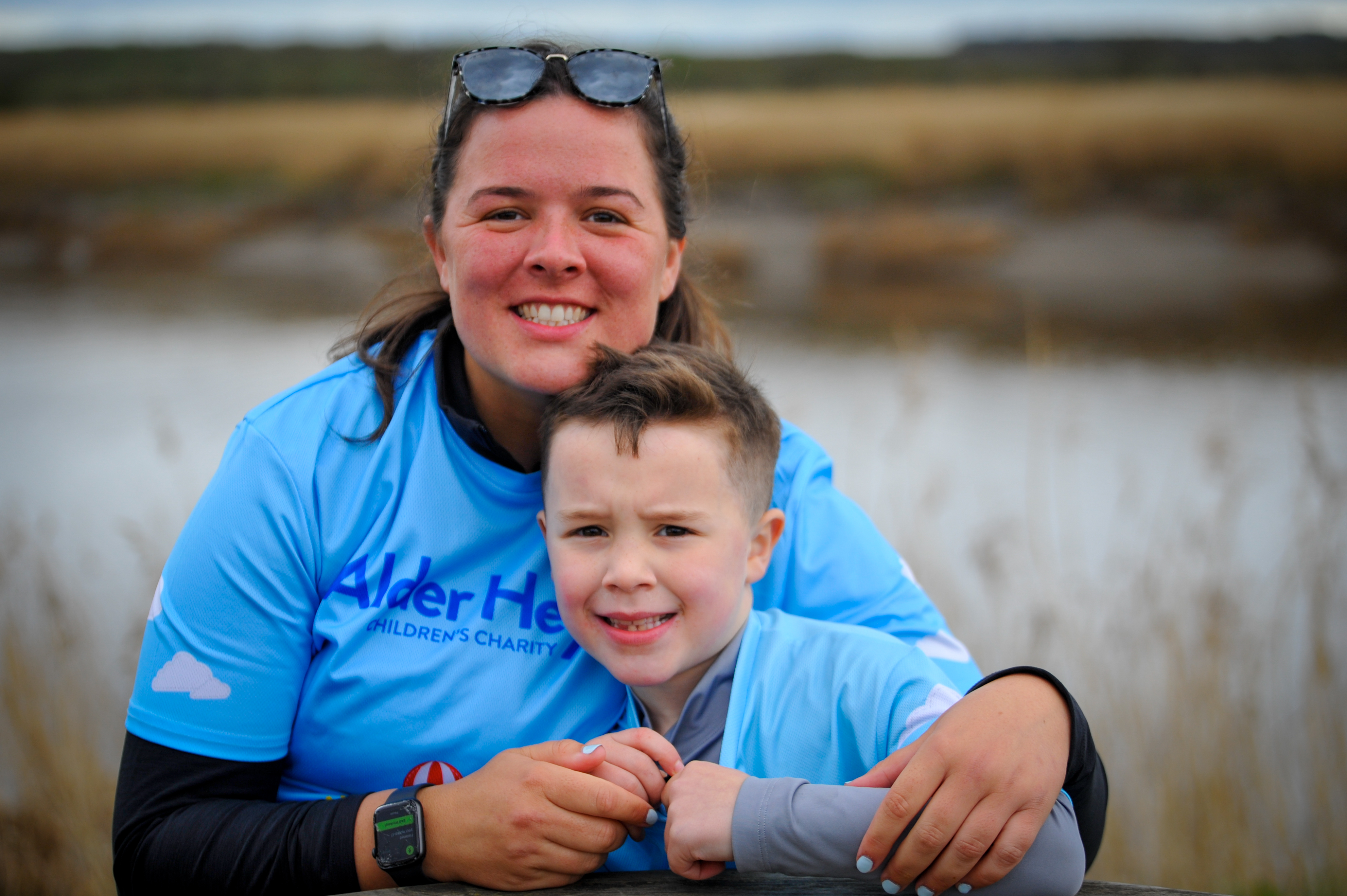 Woman hugging a boy