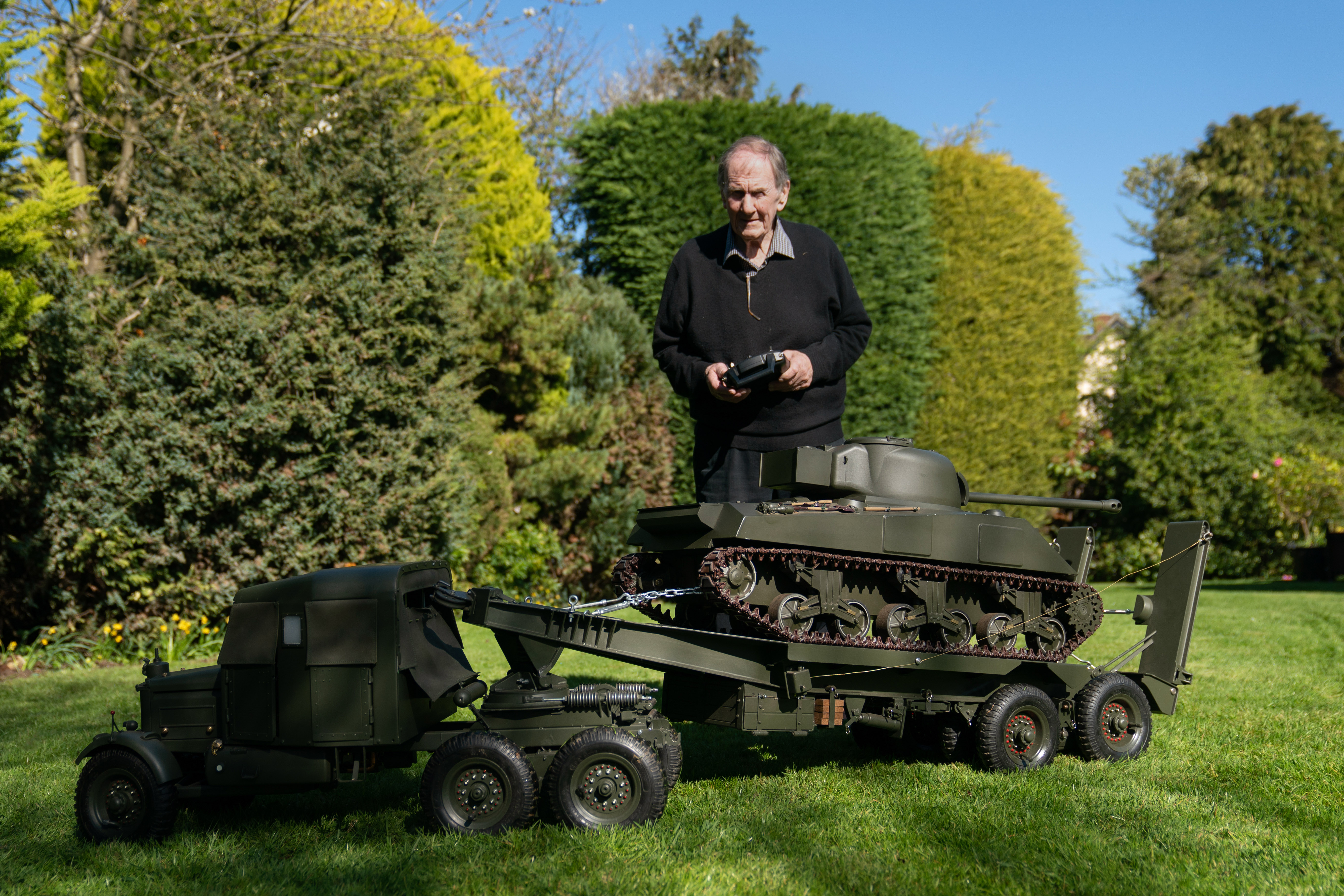 Roland Hopper, 79, built the scale model tank and transporter as he was bored in retirement. (Joe Giddens/ PA)