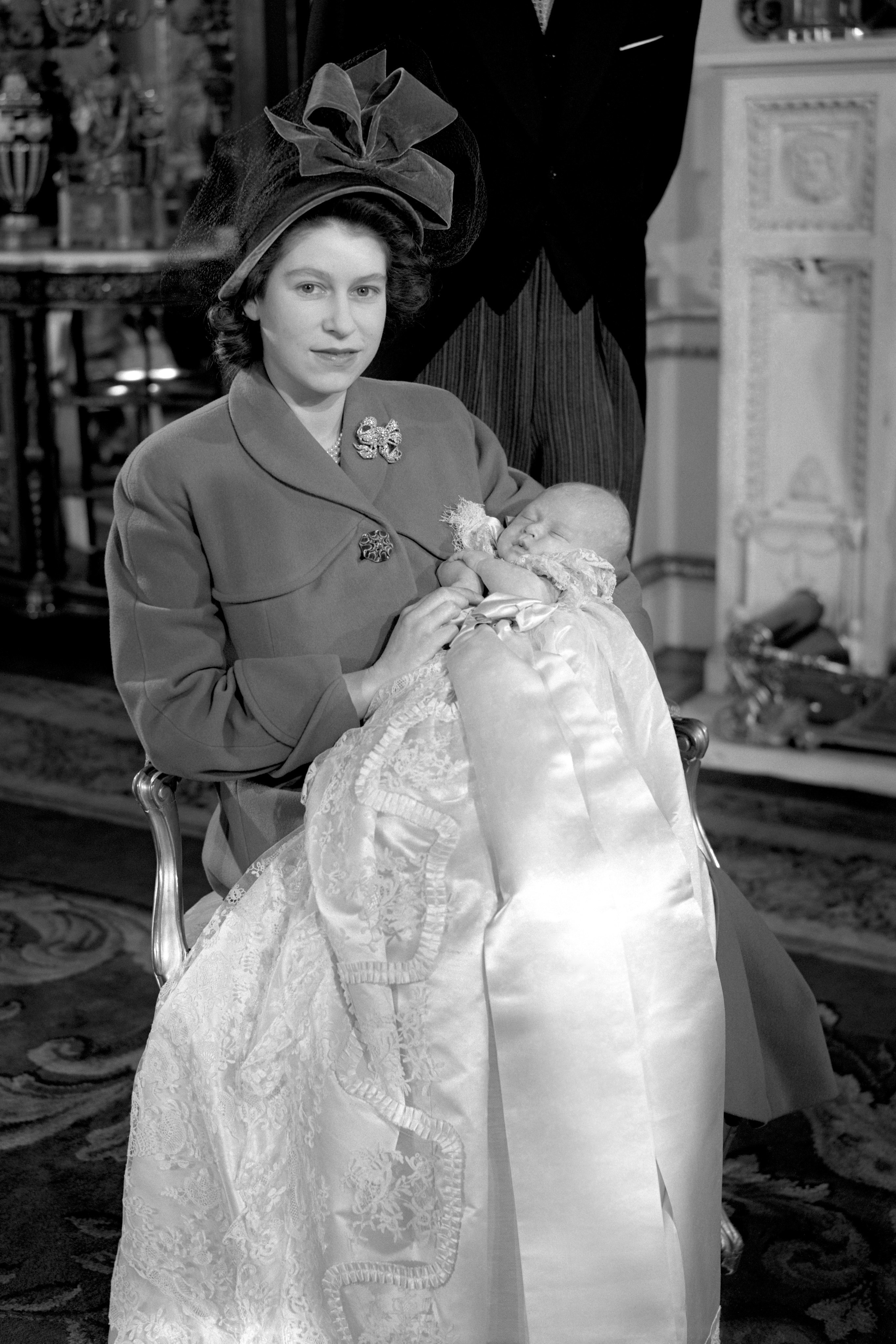 Princess Elizabeth holding her infant son, Prince Charles in 1948 