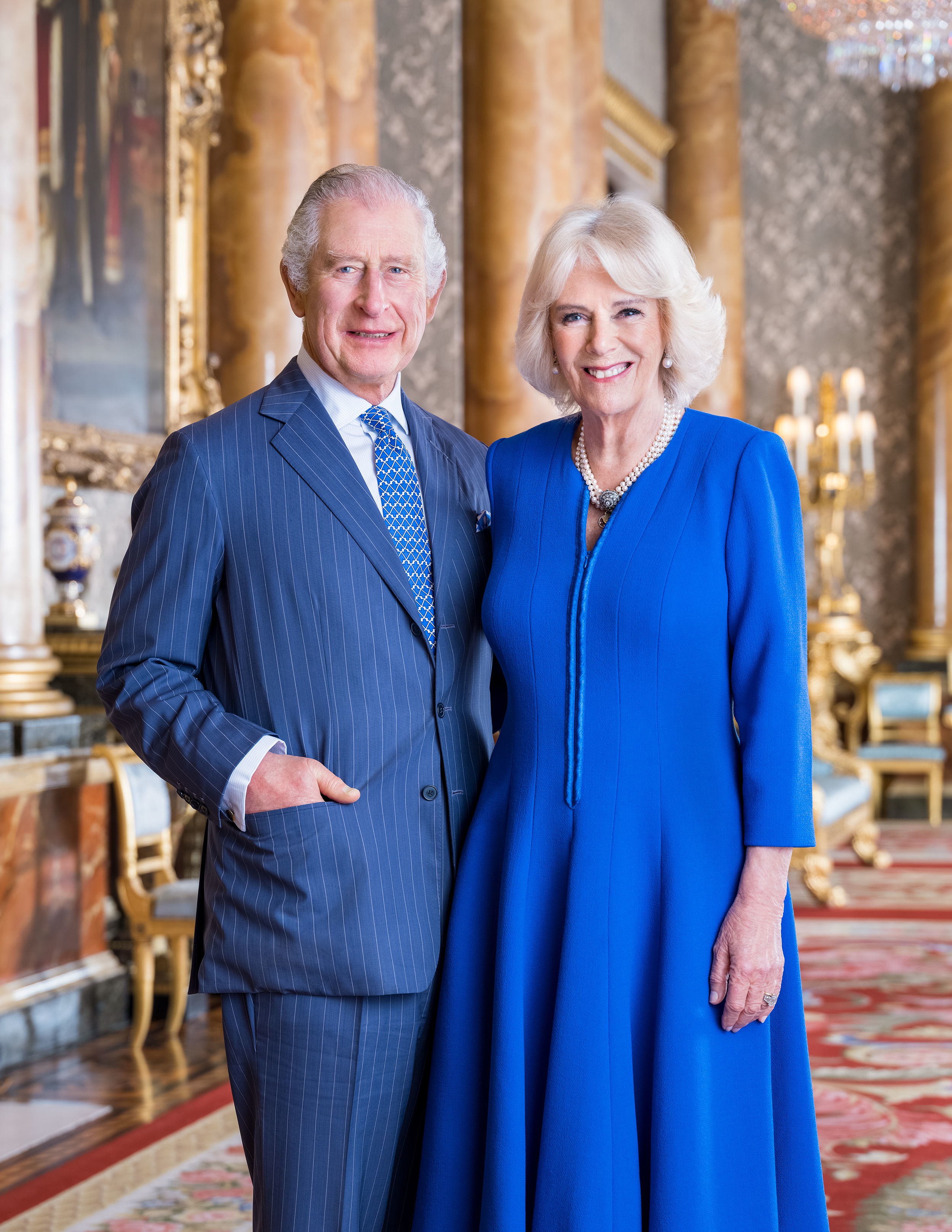 The King and Queen Consort in the Blue Drawing Room at Buckingham Palace in 2023