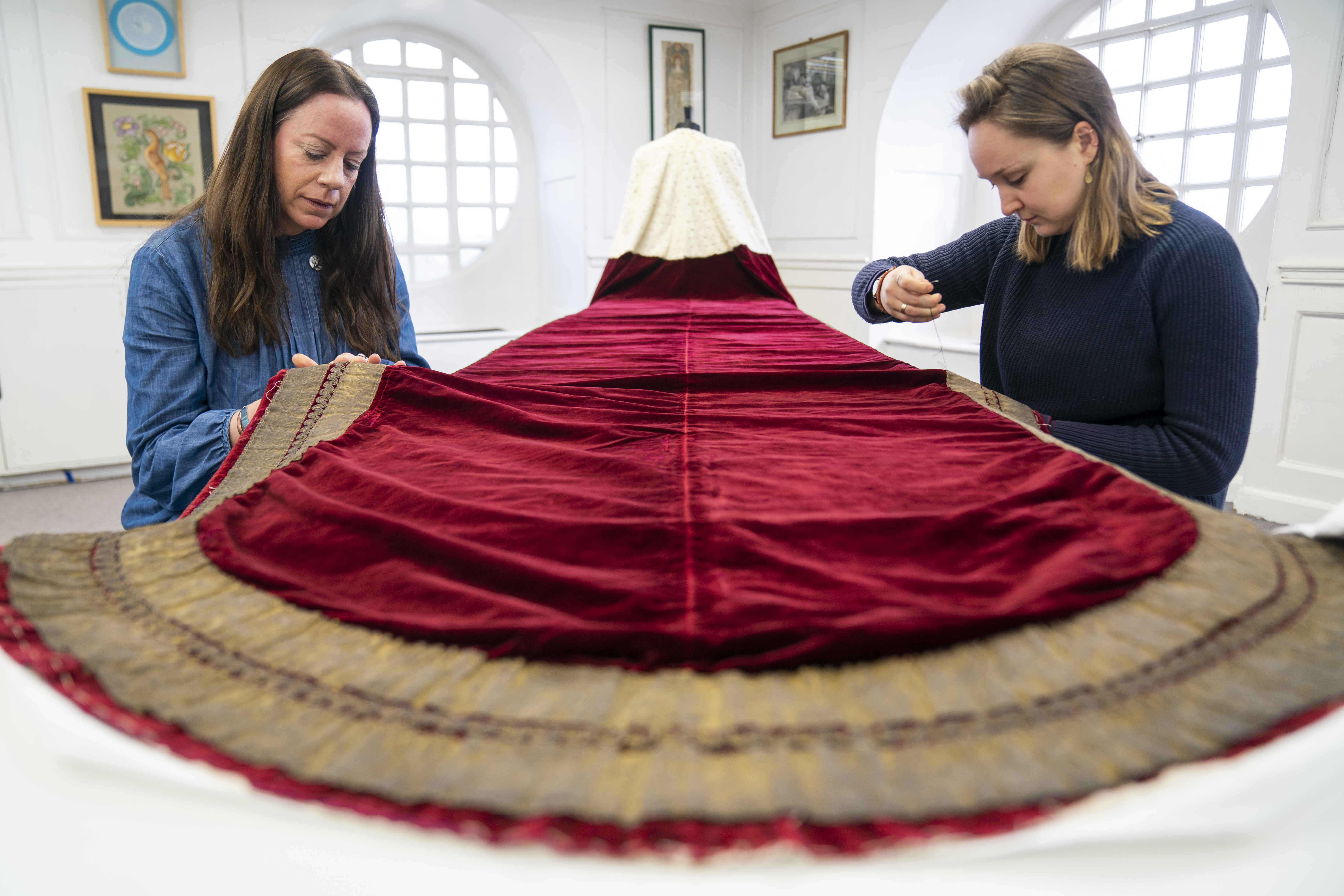 Conservation work on George VI's Robe of State which will be worn by the King