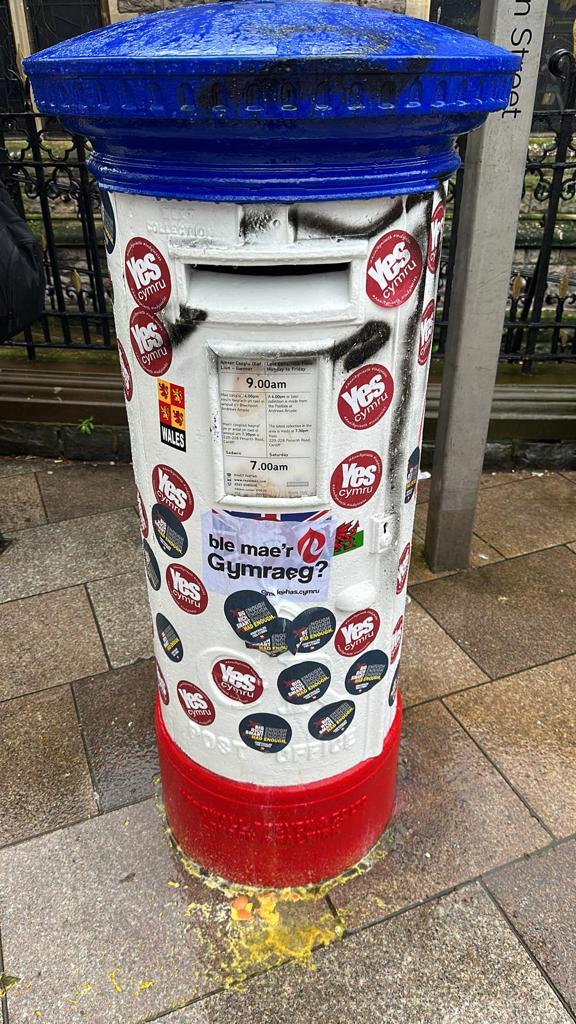 Welsh independence and pro-republican stickers adorn the box which was decorated with Union flag colours,