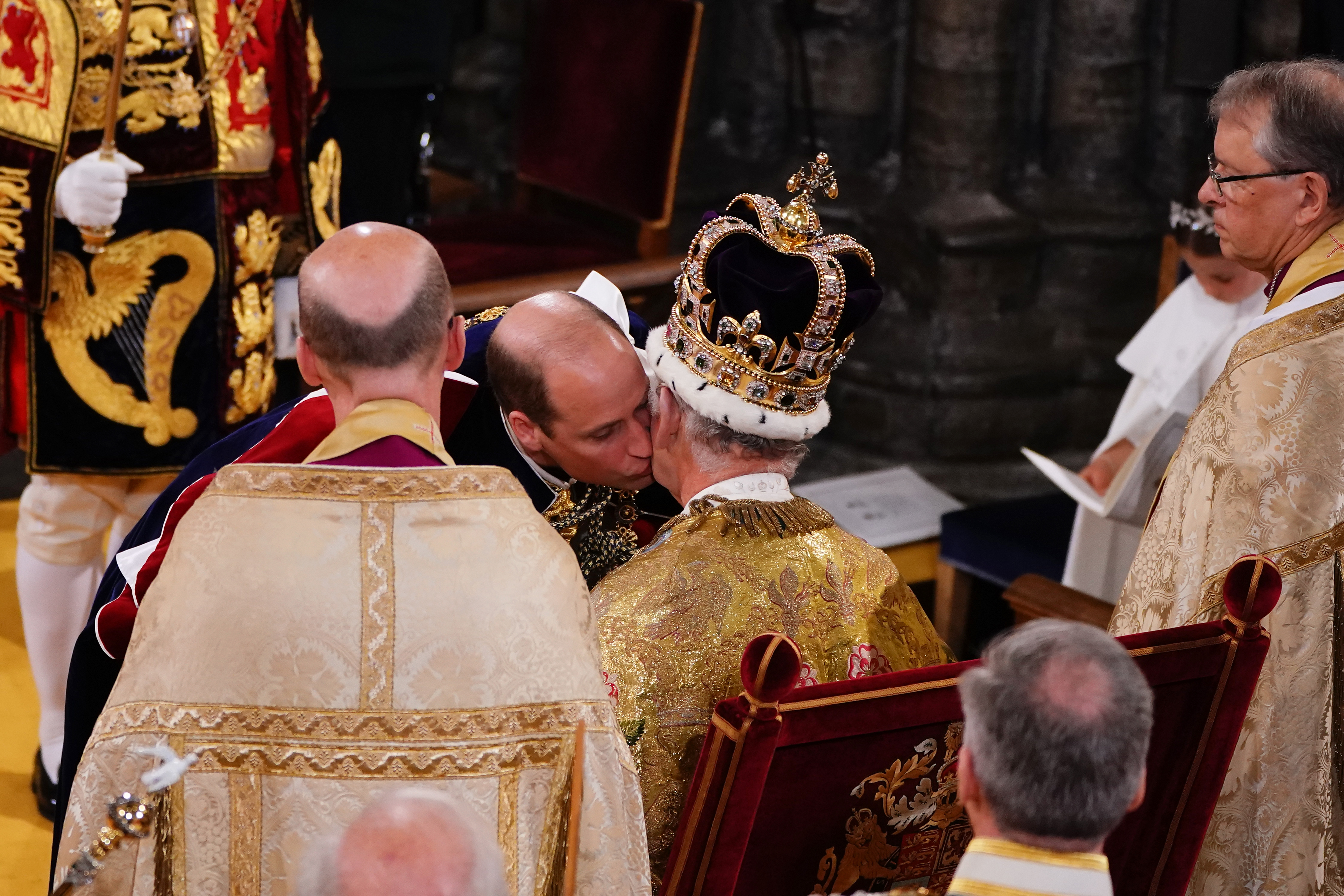 The Prince of Wales kisses the King on the cheek