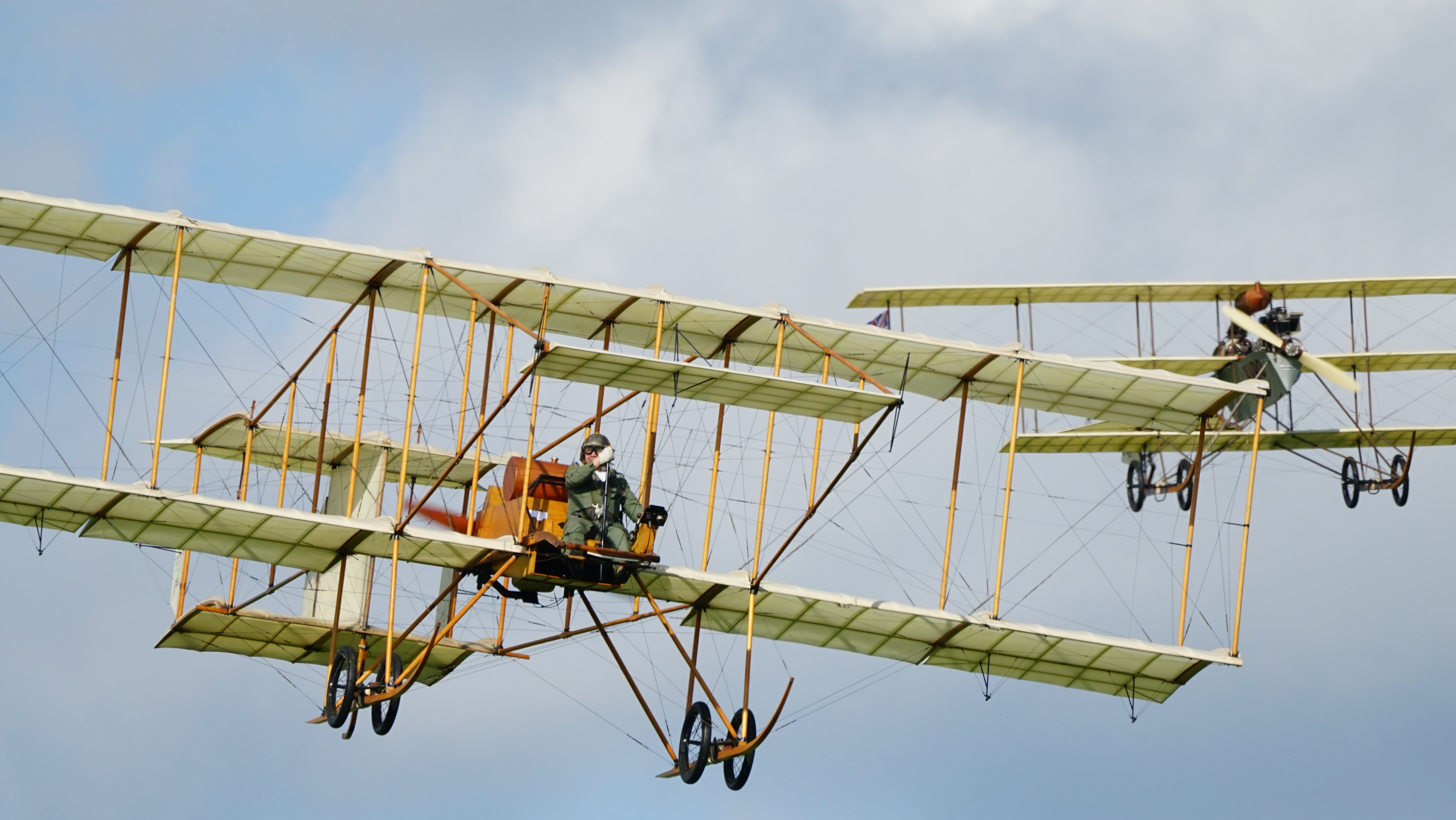 Edwardian-era aircrafts, the Roe IV Triplane and the Bristol Boxkite, taking part in the King and Country Air Show at Shuttleworth aerodrome on Sunday, May 7 2023