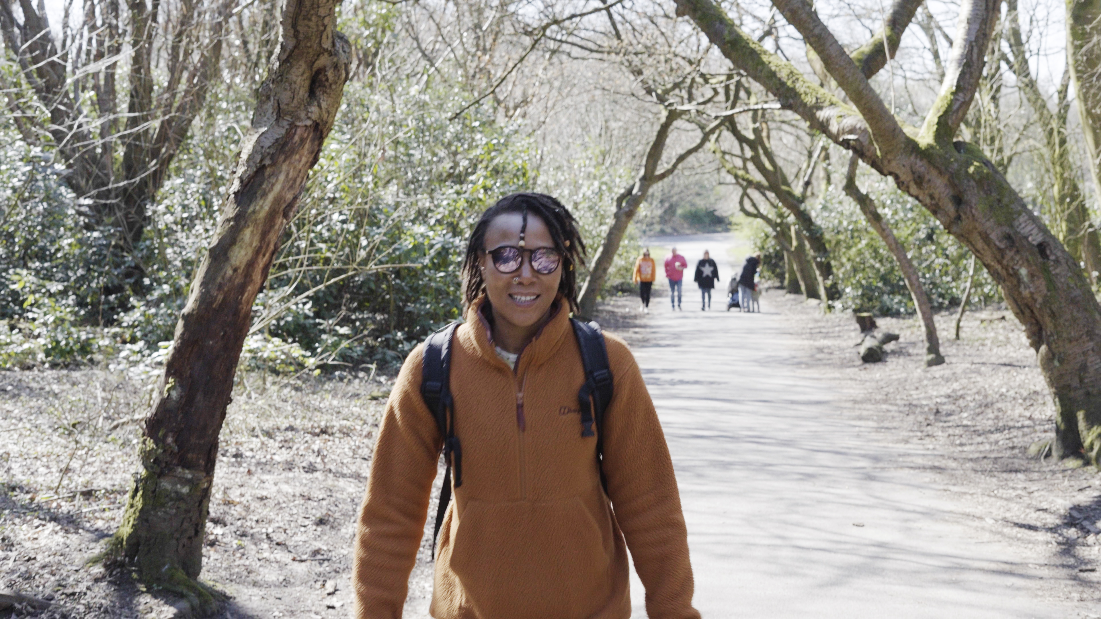 Rhiane Fatinikun, founder of Black Girls Hike, explores Heaton Park in Manchester as part of Historic England's Missing Pieces Project. (Historic England/ PA)