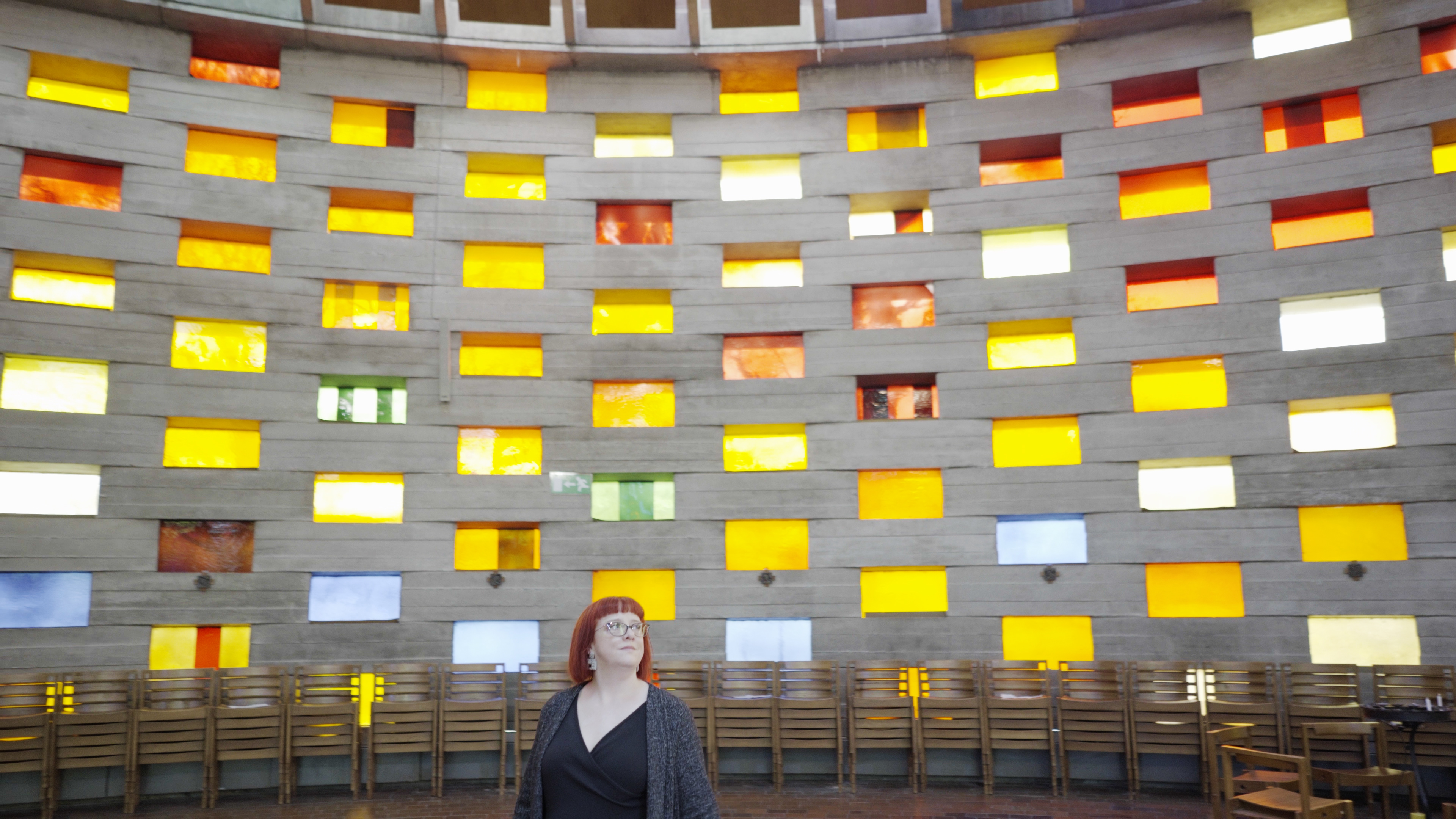 Comedian Angela Barnes visits the Grade II* listed Meeting House at the University of Sussex in Brighton. (Historic England/ PA)