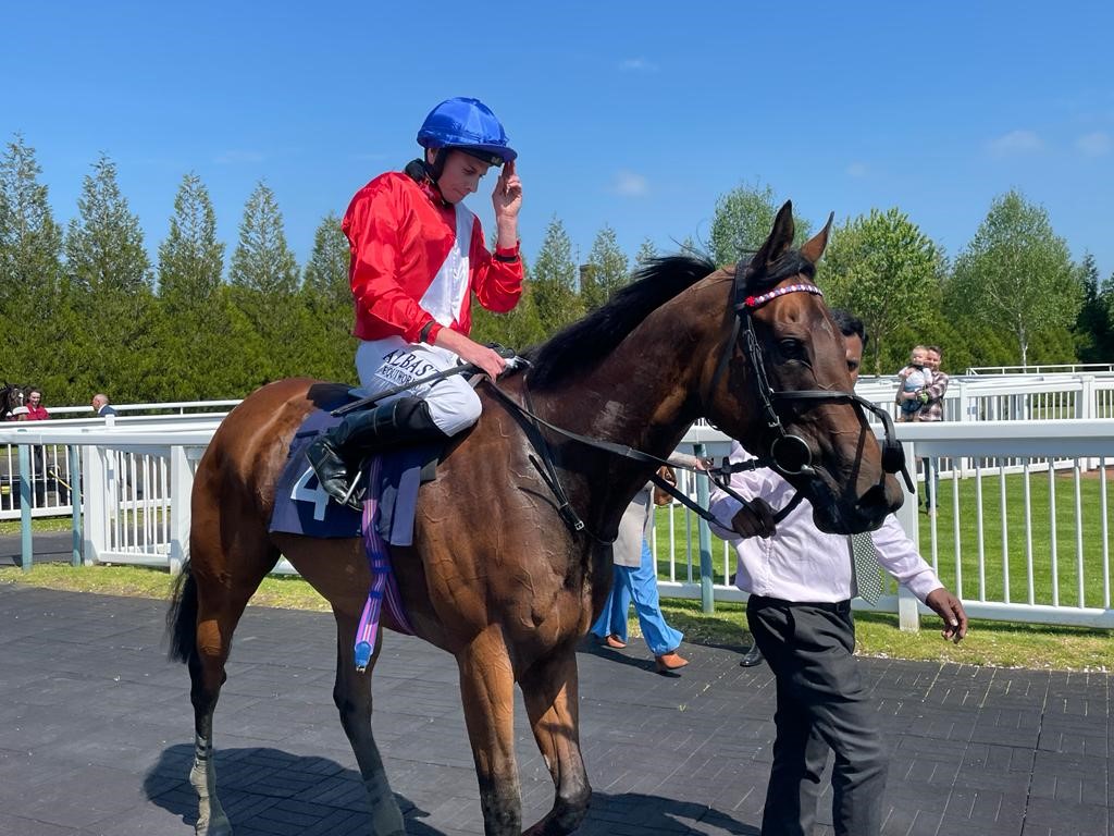 Sacred and Ryan Moore winning the Fitzdares Chartwell Fillies’ Stakes at Lingfield 