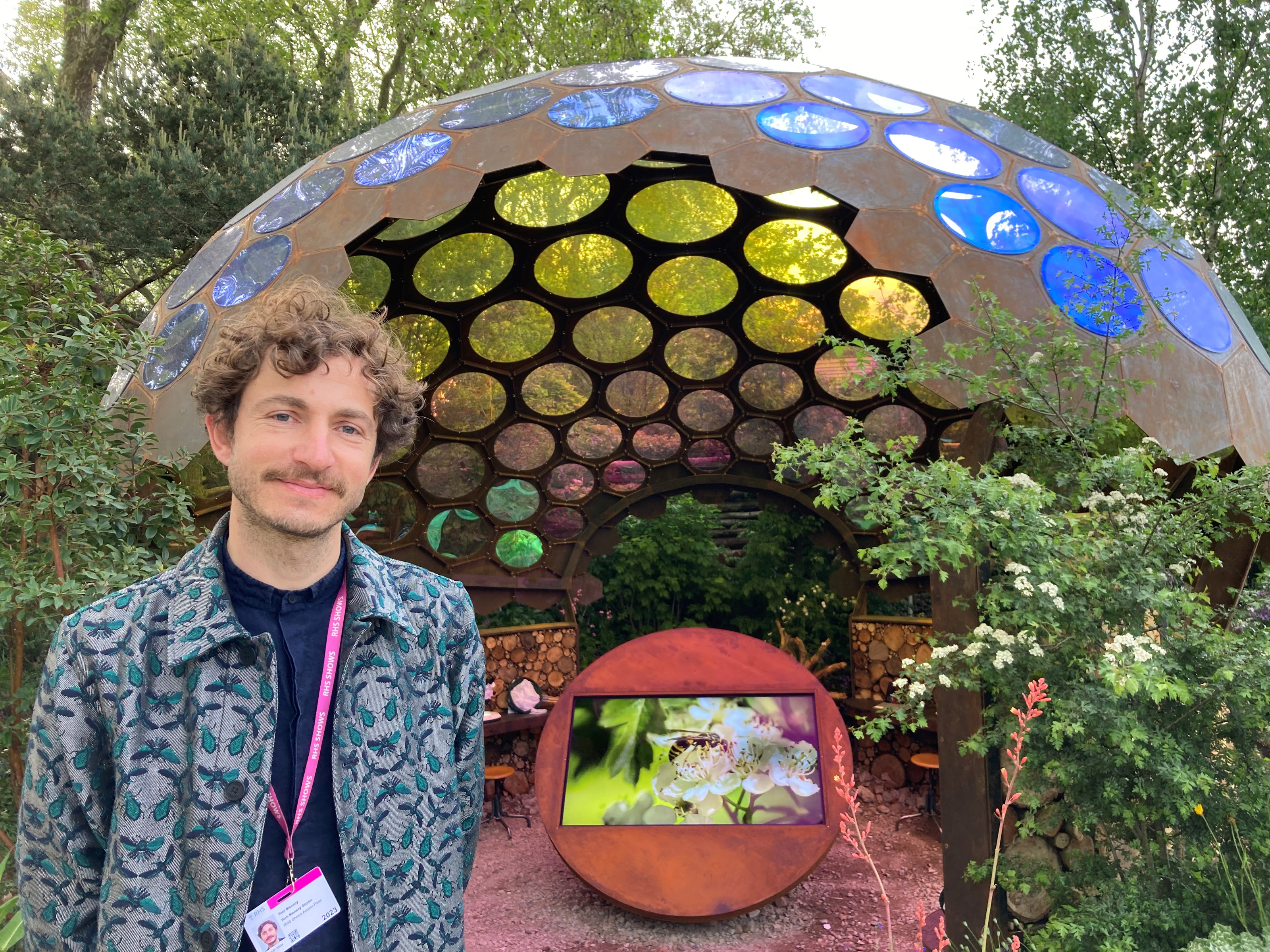 Tom Massey in front of his garden at RHS Chelsea Flower Show 2023