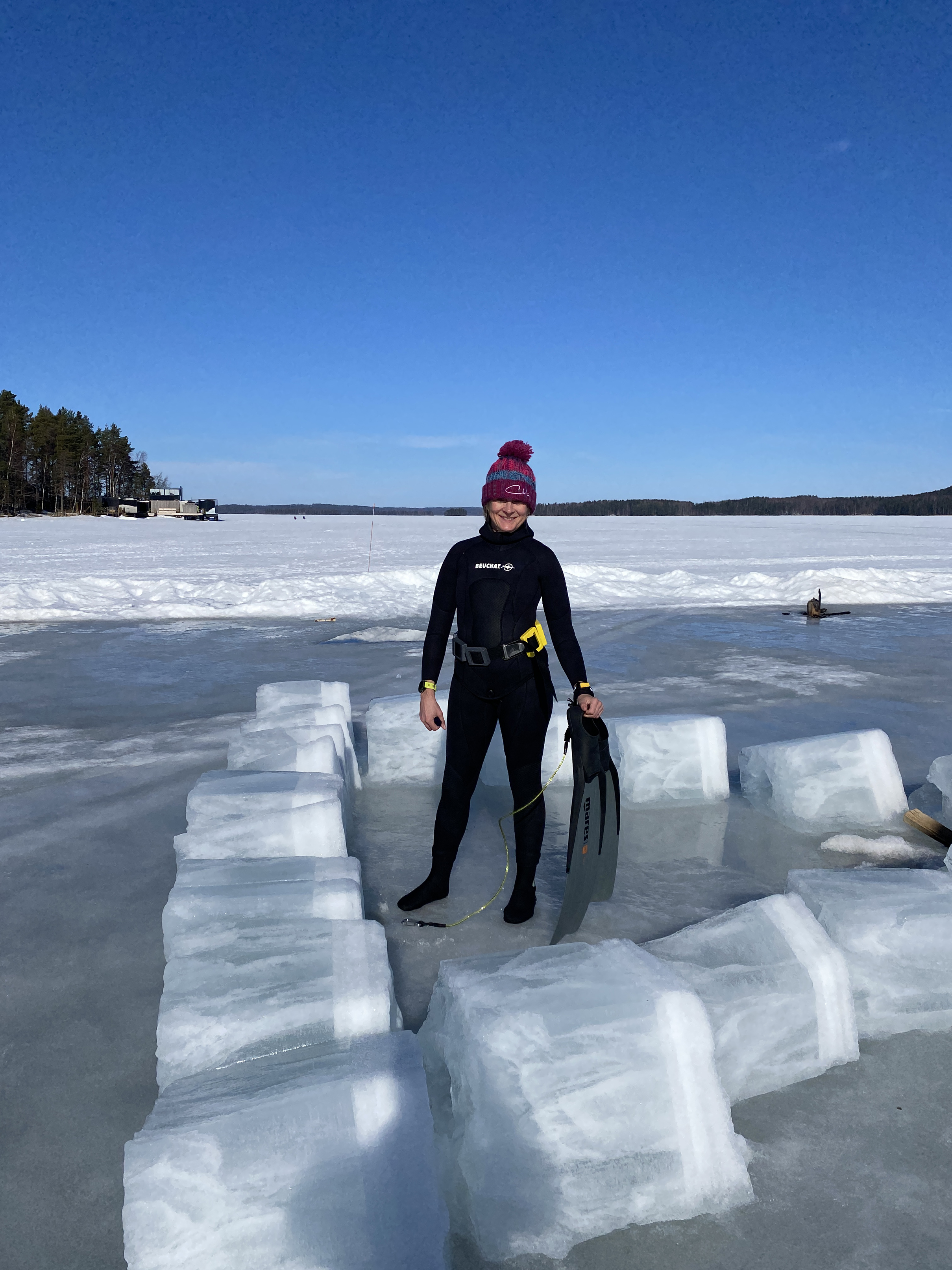 Louise Minchin free-diving under ice in Finland (Bloomsbury Sport/PA)