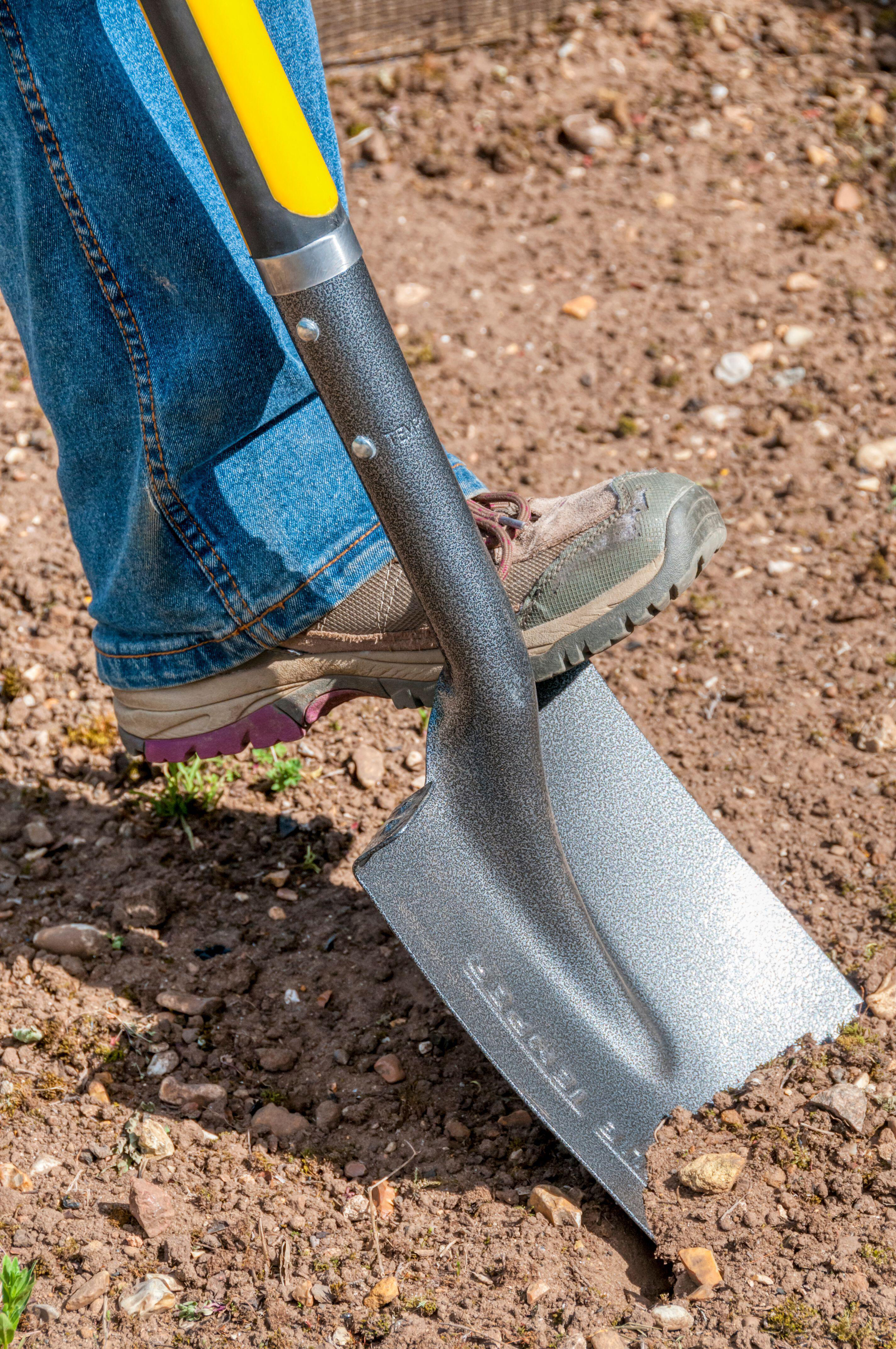 Digging with a spade (Alamy/PA)