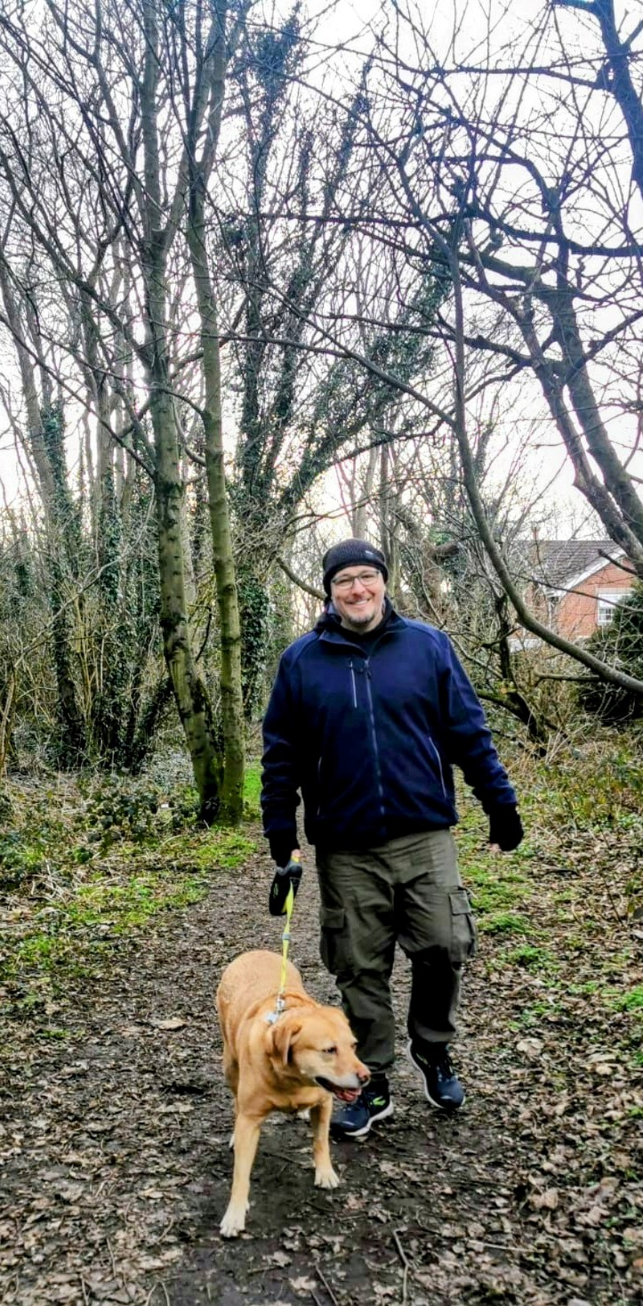 Simon and Bella walking in the woods