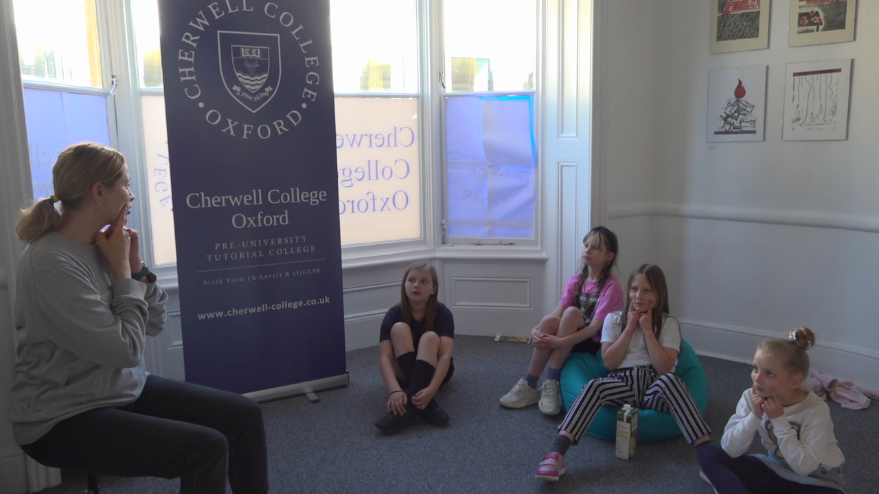 Children sitting on the ground