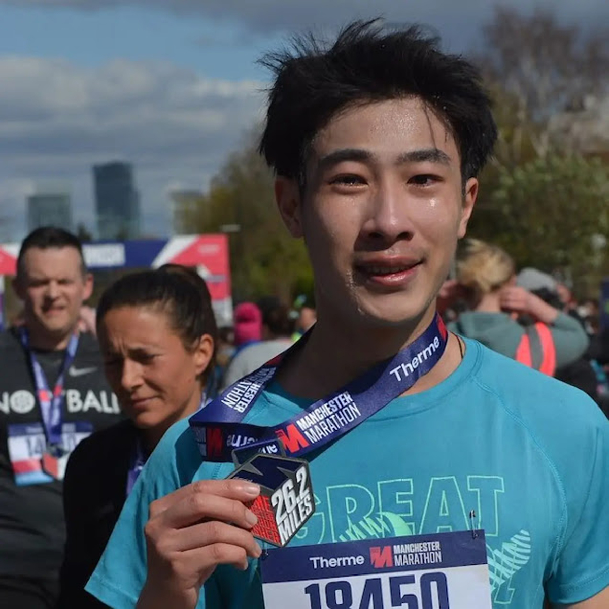 Viet-Anh crying tears of joy after the finishing in the Manchester Marathon in 2022 (University of Bristol/PA)