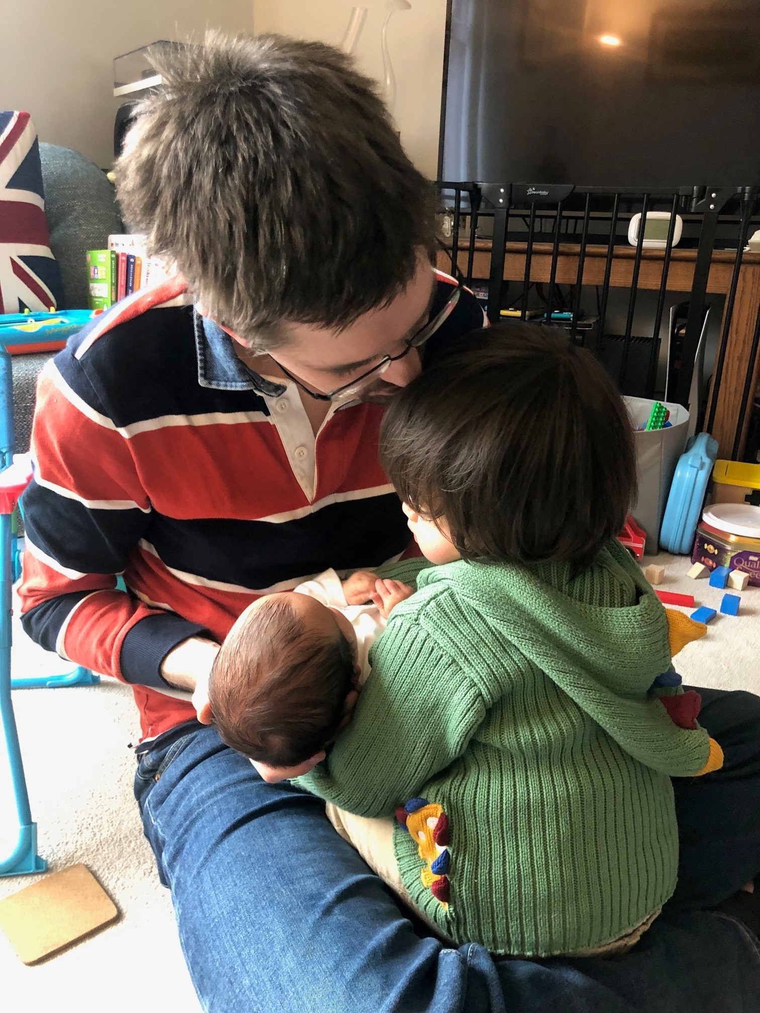Man with two children