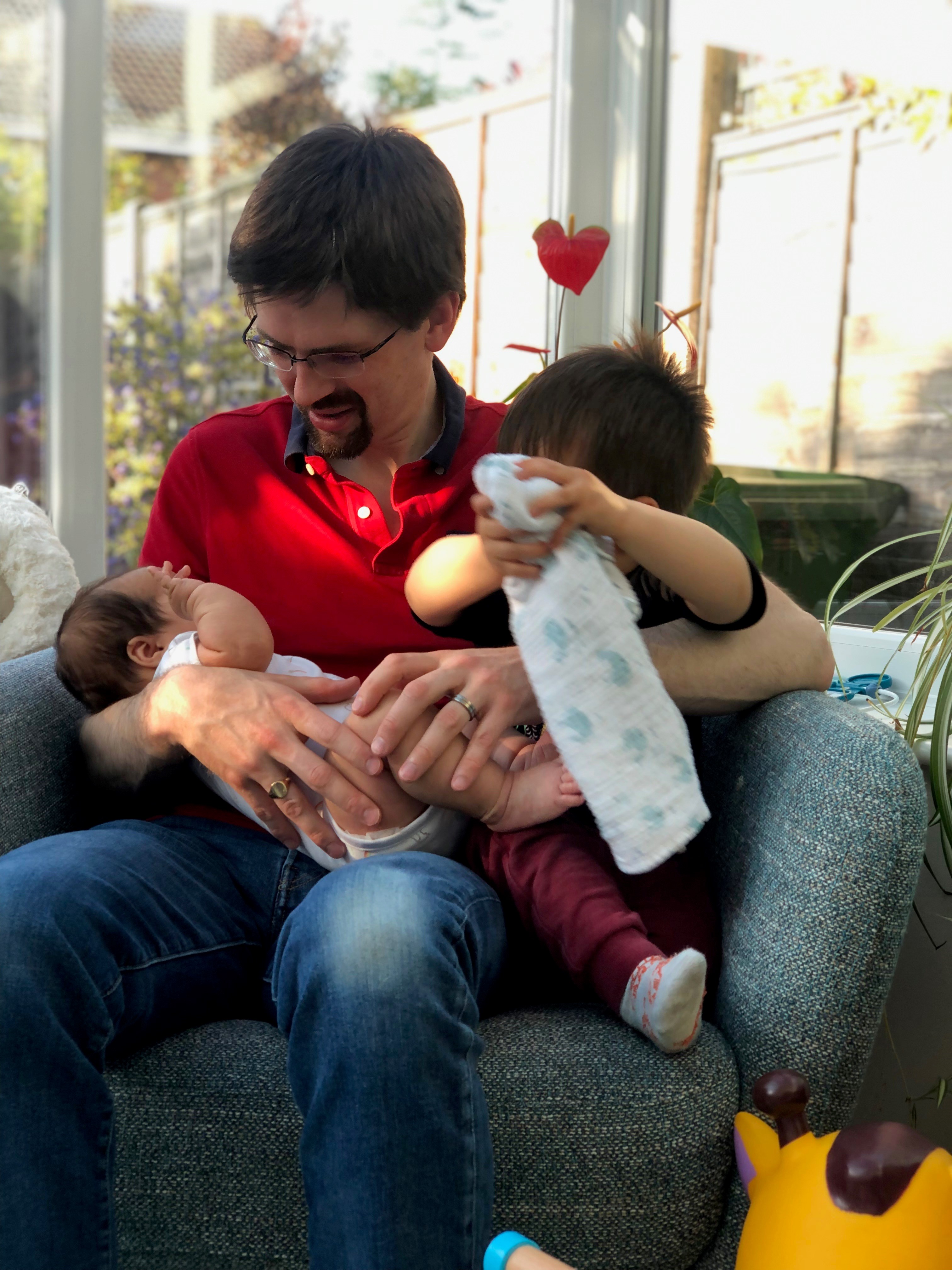 Man with two children
