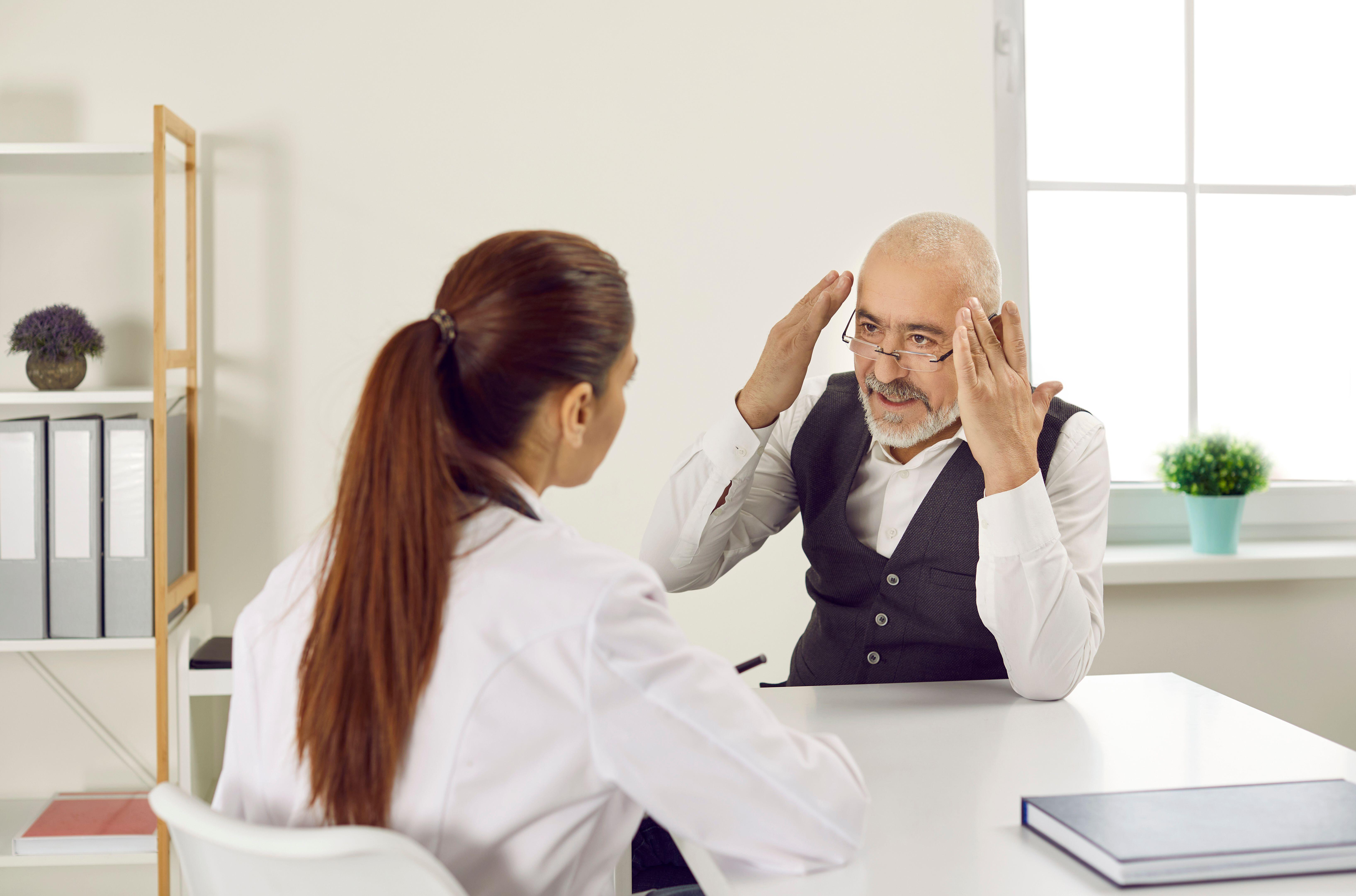 Patient talking to a doctor during a consultation
