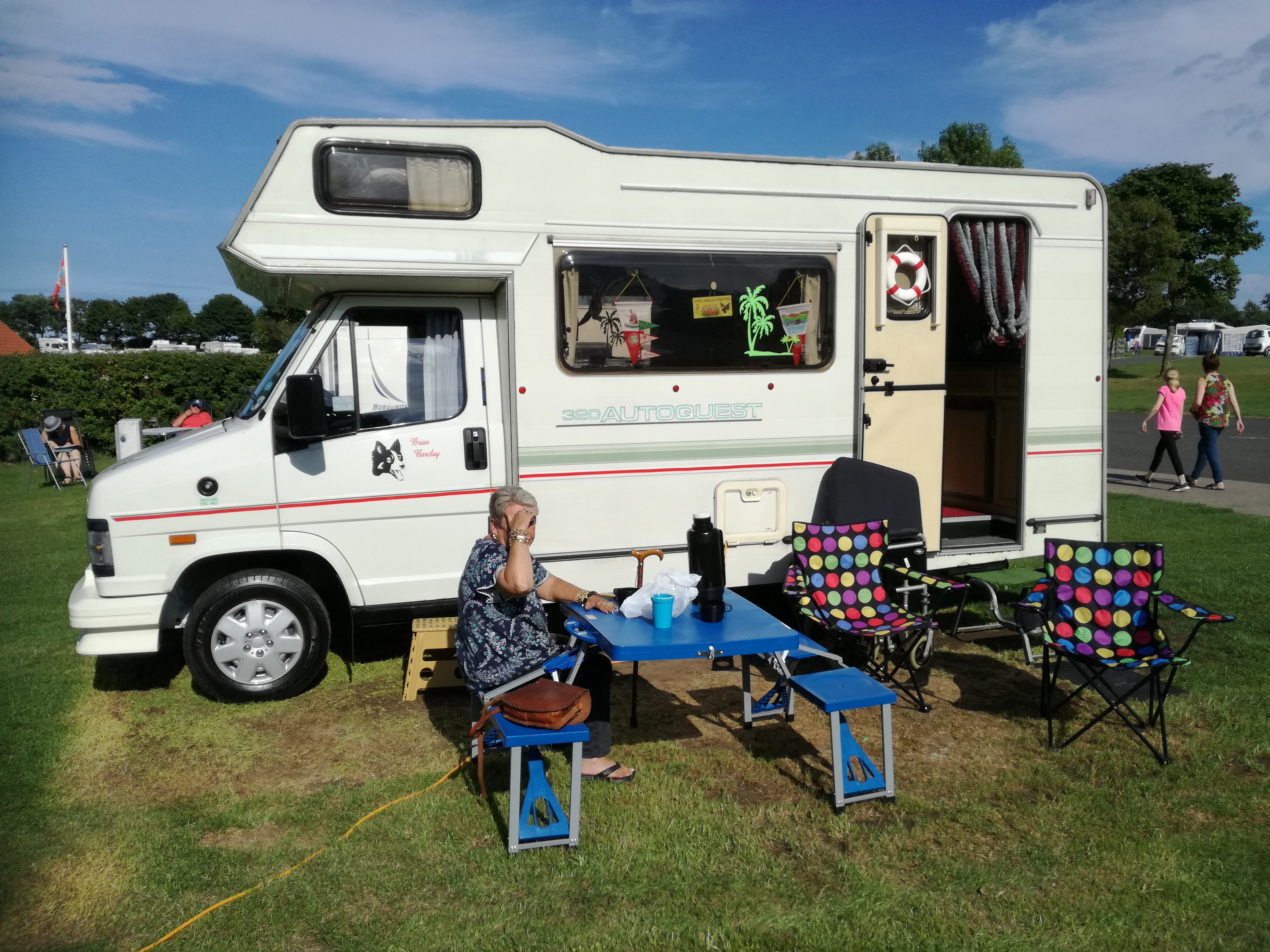 Gerry and Christine outside their mobile home