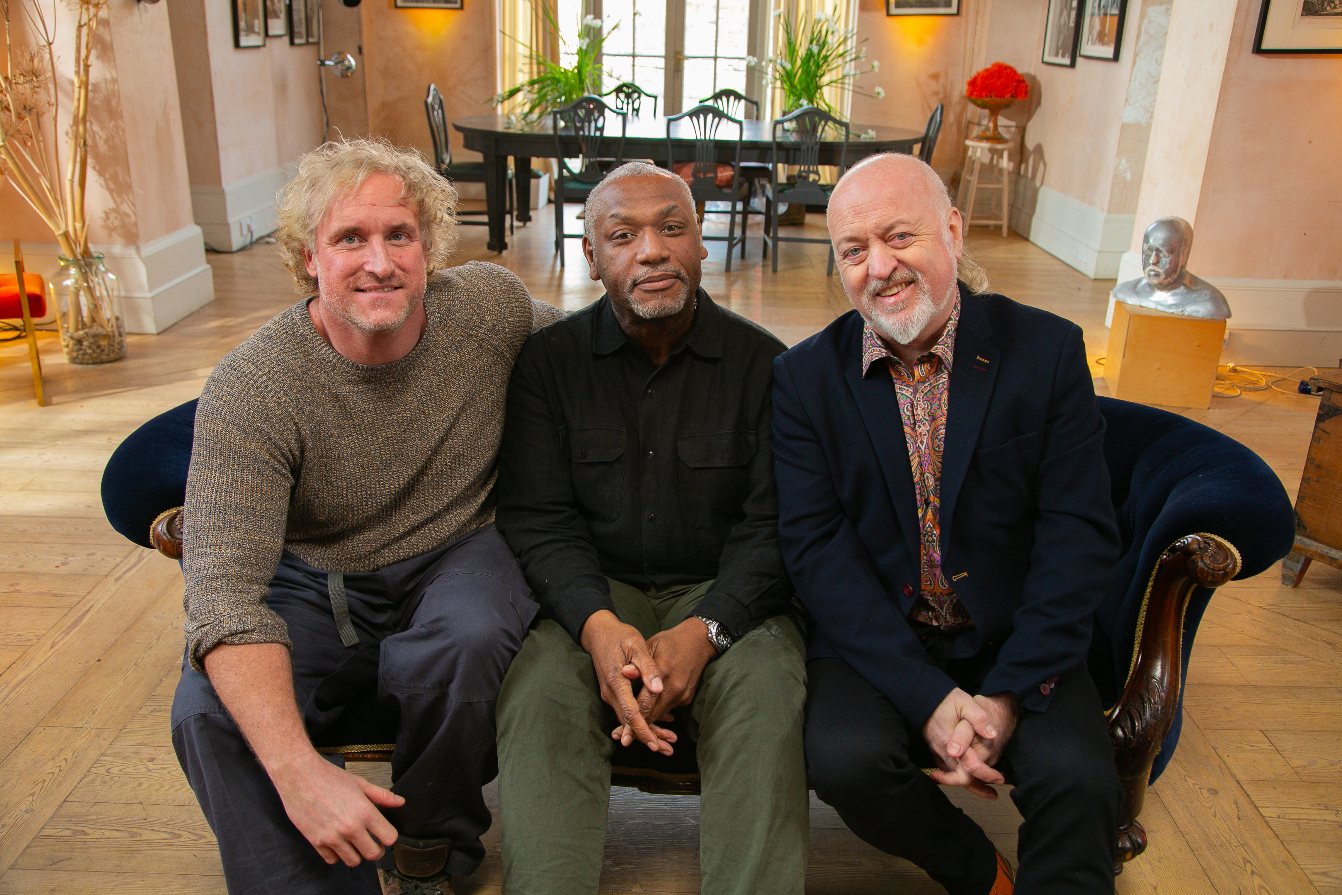 Bill Bailey sitting in studio with sculptor Nick Elphick, and trauma surgeon Martin Griffiths